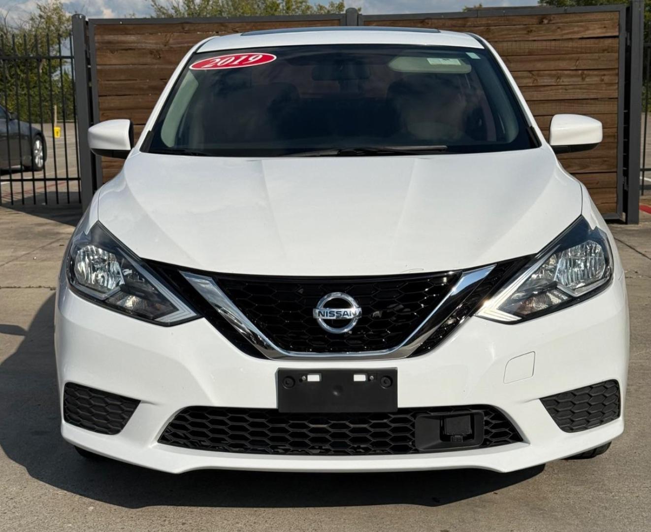 2019 White Nissan Sentra SV (3N1AB7AP3KY) with an 1.8L I-4 DOHC engine, located at 2401 E Main St., Grand Prairie, TX, 75050, (972) 262-4440, 32.748981, -96.969643 - Photo#1