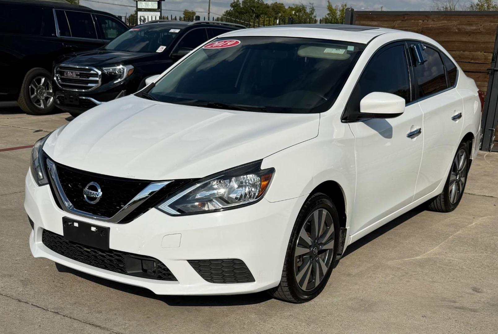 2019 White Nissan Sentra SV (3N1AB7AP3KY) with an 1.8L I-4 DOHC engine, located at 2401 E Main St., Grand Prairie, TX, 75050, (972) 262-4440, 32.748981, -96.969643 - Photo#2