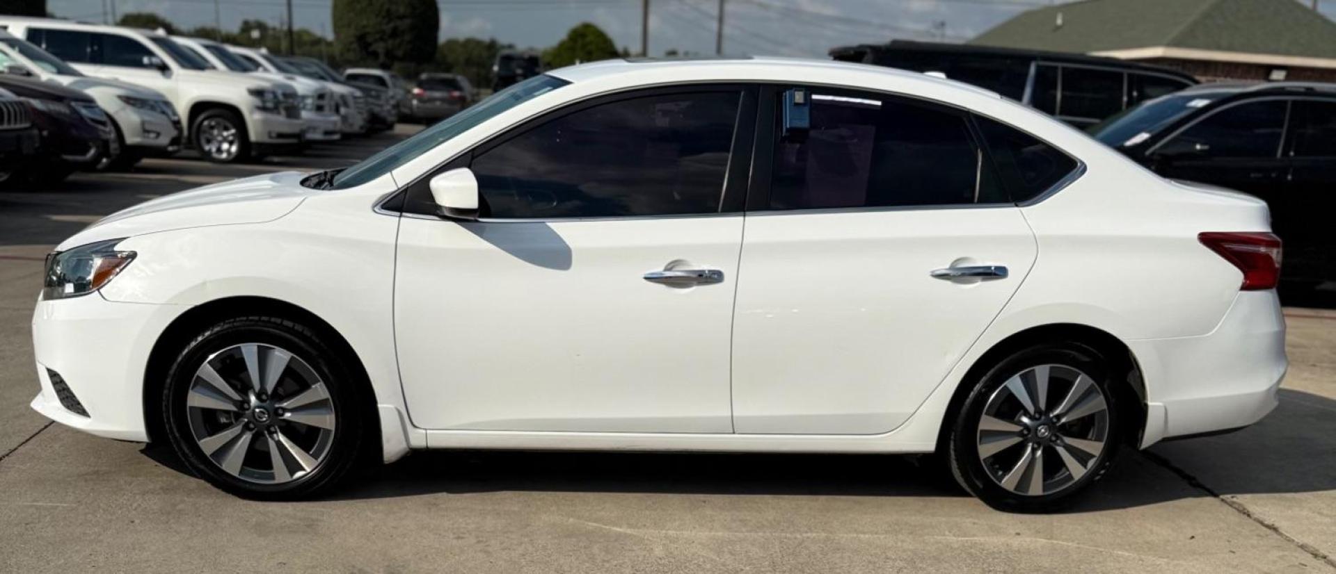 2019 White Nissan Sentra SV (3N1AB7AP3KY) with an 1.8L I-4 DOHC engine, located at 2401 E Main St., Grand Prairie, TX, 75050, (972) 262-4440, 32.748981, -96.969643 - Photo#5