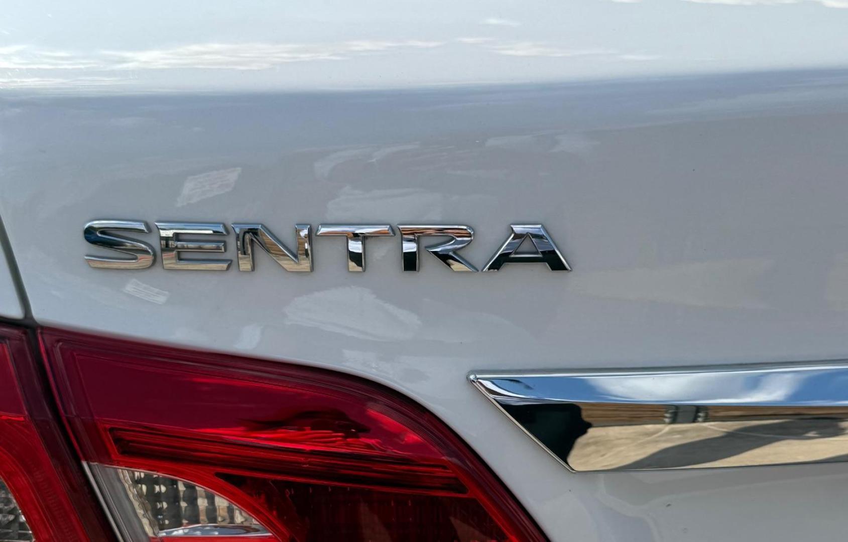 2019 White Nissan Sentra SV (3N1AB7AP3KY) with an 1.8L I-4 DOHC engine, located at 2401 E Main St., Grand Prairie, TX, 75050, (972) 262-4440, 32.748981, -96.969643 - Photo#27