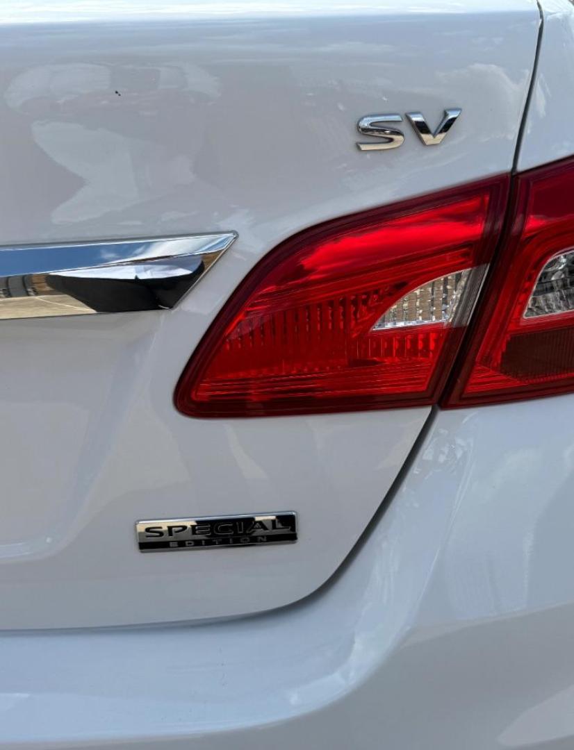 2019 White Nissan Sentra SV (3N1AB7AP3KY) with an 1.8L I-4 DOHC engine, located at 2401 E Main St., Grand Prairie, TX, 75050, (972) 262-4440, 32.748981, -96.969643 - Photo#29