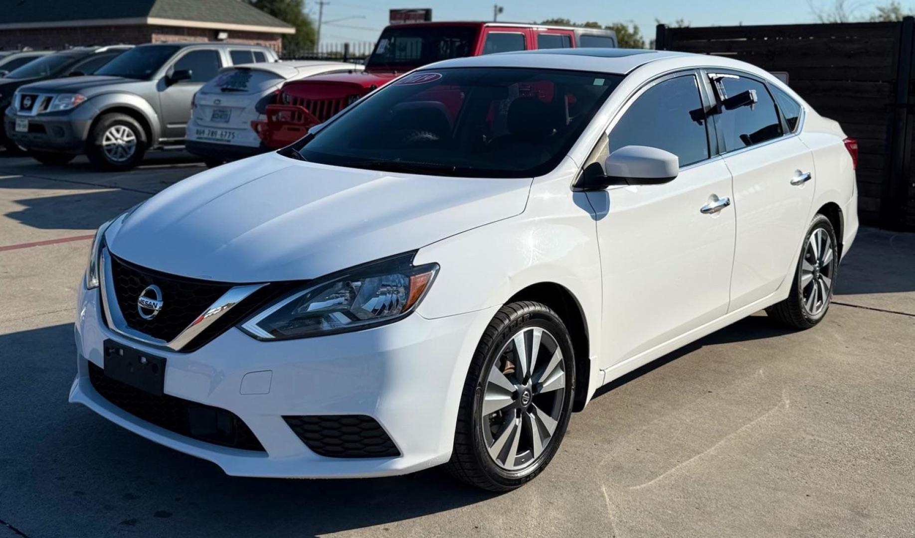 2019 Gray Nissan Versa 1.6 SV (3N1CN7AP8KL) with an 1.6L I-4 DOHC engine, located at 2401 E Main St., Grand Prairie, TX, 75050, (972) 262-4440, 32.748981, -96.969643 - Photo#2