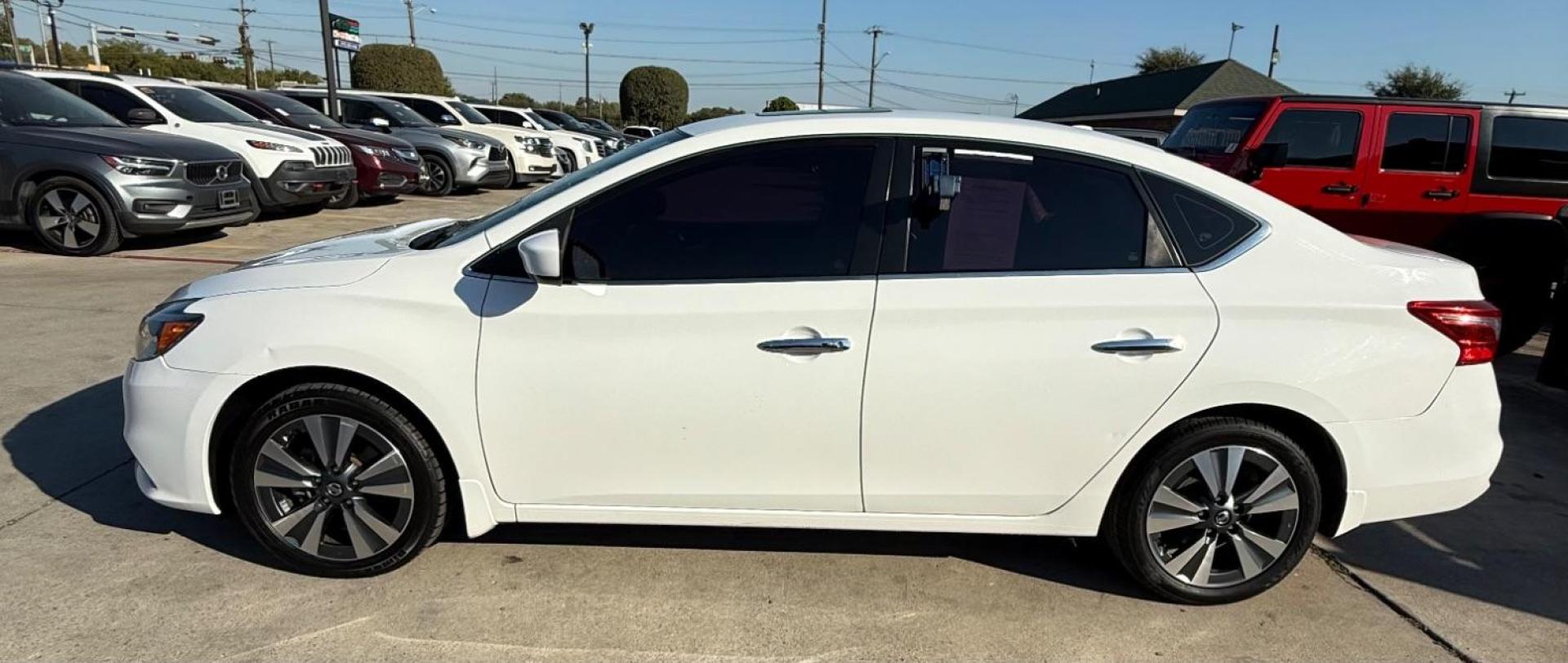 2019 Gray Nissan Versa 1.6 SV (3N1CN7AP8KL) with an 1.6L I-4 DOHC engine, located at 2401 E Main St., Grand Prairie, TX, 75050, (972) 262-4440, 32.748981, -96.969643 - Photo#4
