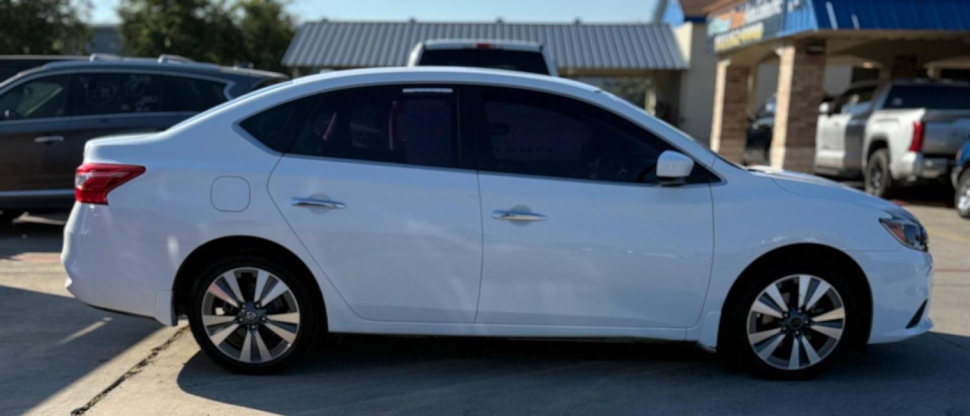 2019 Gray Nissan Versa 1.6 SV (3N1CN7AP8KL) with an 1.6L I-4 DOHC engine, located at 2401 E Main St., Grand Prairie, TX, 75050, (972) 262-4440, 32.748981, -96.969643 - Photo#16