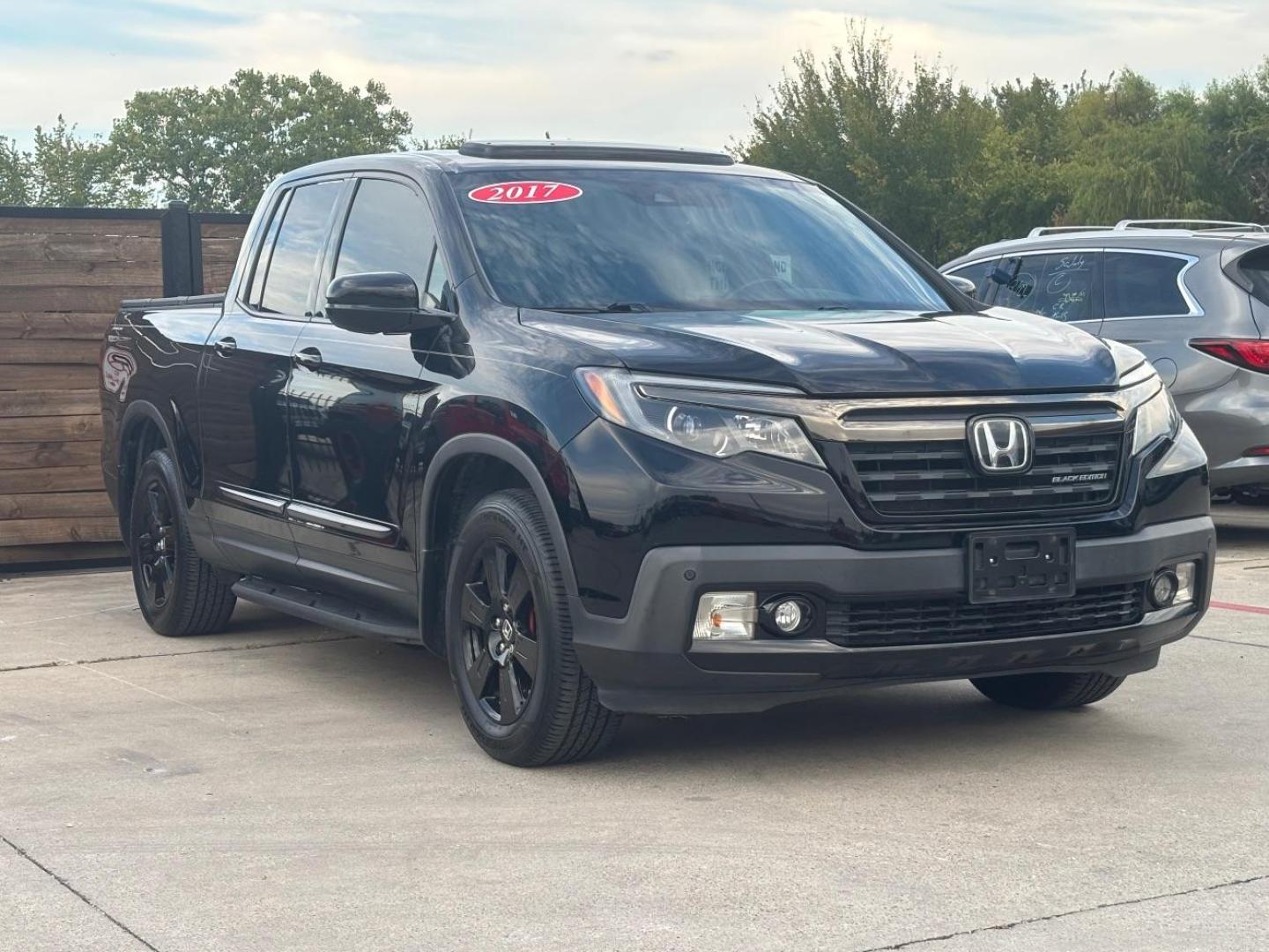 2017 Black Honda Ridgeline Black Edition (5FPYK3F84HB) with an 3.5L V-6 gasoline direct injection engine, located at 2401 E Main St., Grand Prairie, TX, 75050, (972) 262-4440, 32.748981, -96.969643 - Photo#1