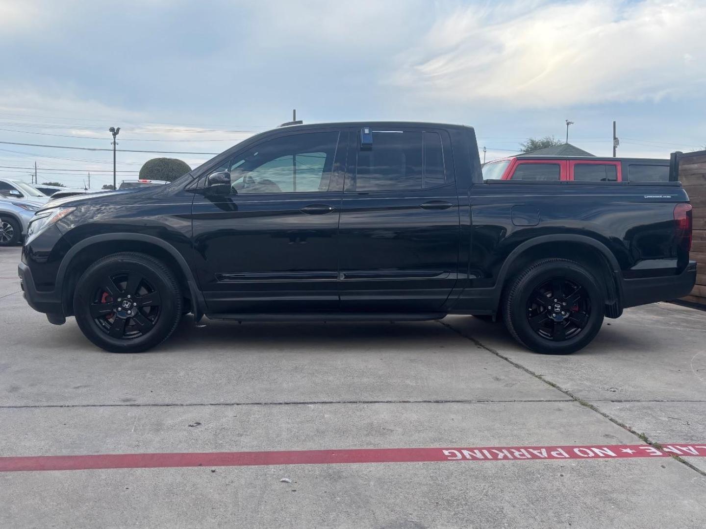 2017 Black Honda Ridgeline Black Edition (5FPYK3F84HB) with an 3.5L V-6 gasoline direct injection engine, located at 2401 E Main St., Grand Prairie, TX, 75050, (972) 262-4440, 32.748981, -96.969643 - Photo#4