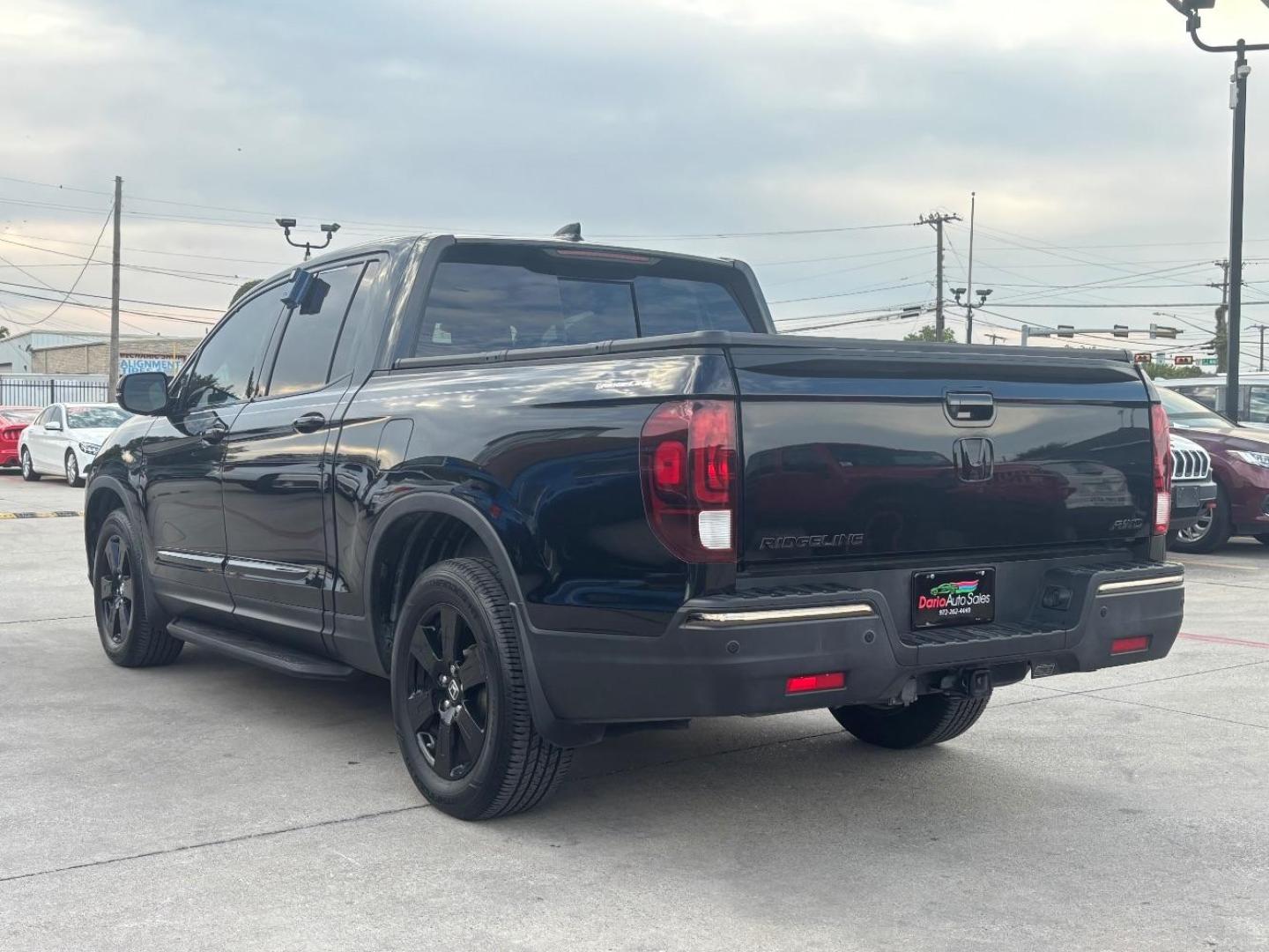 2017 Black Honda Ridgeline Black Edition (5FPYK3F84HB) with an 3.5L V-6 gasoline direct injection engine, located at 2401 E Main St., Grand Prairie, TX, 75050, (972) 262-4440, 32.748981, -96.969643 - Photo#5