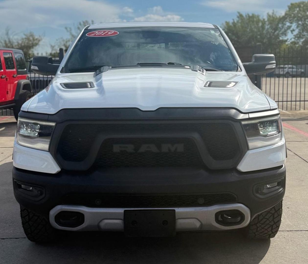 2019 White Ram 1500 Rebel Crew Cab 4x4 5'7 Box (1C6SRFLT4KN) , located at 2401 E Main St., Grand Prairie, TX, 75050, (972) 262-4440, 32.748981, -96.969643 - Photo#1
