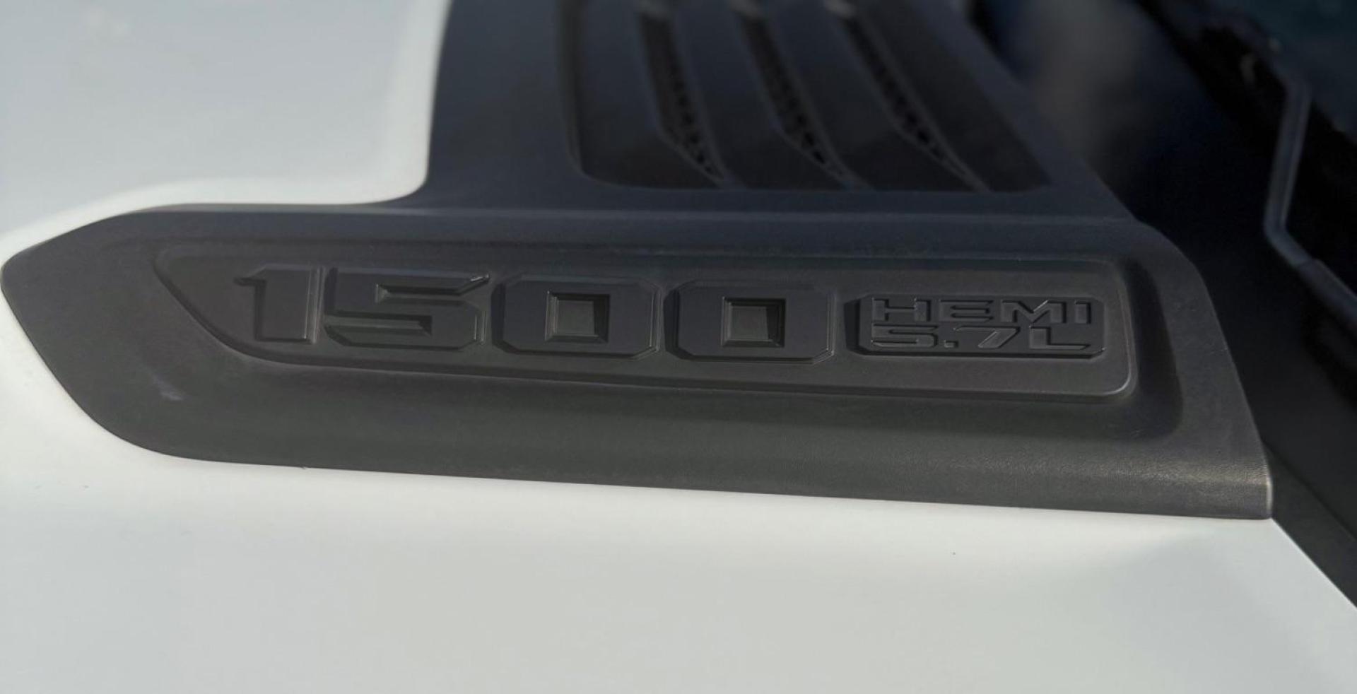 2019 White Ram 1500 Rebel Crew Cab 4x4 5'7 Box (1C6SRFLT4KN) , located at 2401 E Main St., Grand Prairie, TX, 75050, (972) 262-4440, 32.748981, -96.969643 - Photo#4