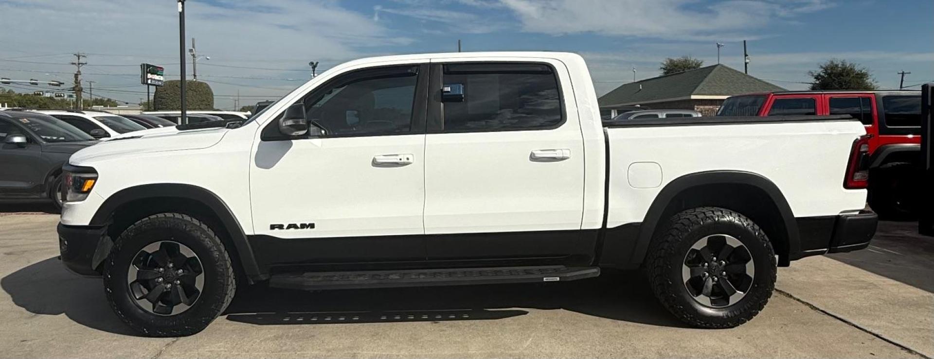 2019 White Ram 1500 Rebel Crew Cab 4x4 5'7 Box (1C6SRFLT4KN) , located at 2401 E Main St., Grand Prairie, TX, 75050, (972) 262-4440, 32.748981, -96.969643 - Photo#5