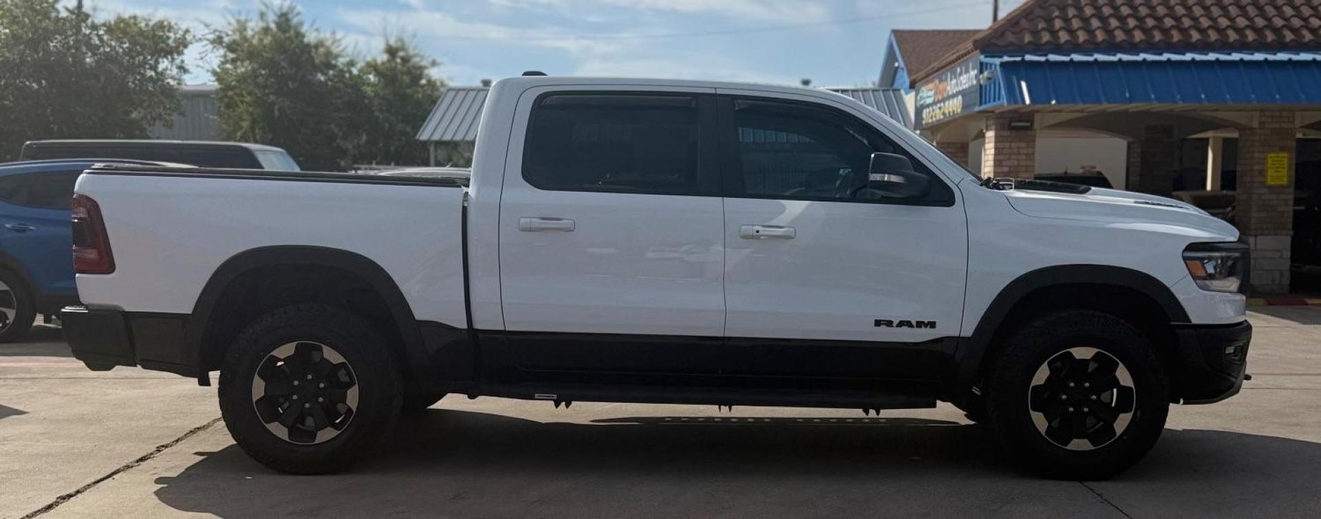 2019 White Ram 1500 Rebel Crew Cab 4x4 5'7 Box (1C6SRFLT4KN) , located at 2401 E Main St., Grand Prairie, TX, 75050, (972) 262-4440, 32.748981, -96.969643 - Photo#15