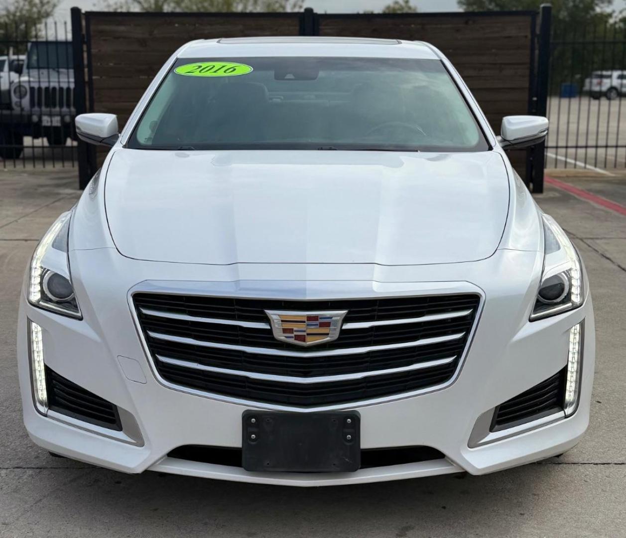 2016 White Cadillac CTS Luxury Collection (1G6AR5SX0G0) with an 2L I-4 gasoline direct injection engine, located at 2401 E Main St., Grand Prairie, TX, 75050, (972) 262-4440, 32.748981, -96.969643 - Photo#1