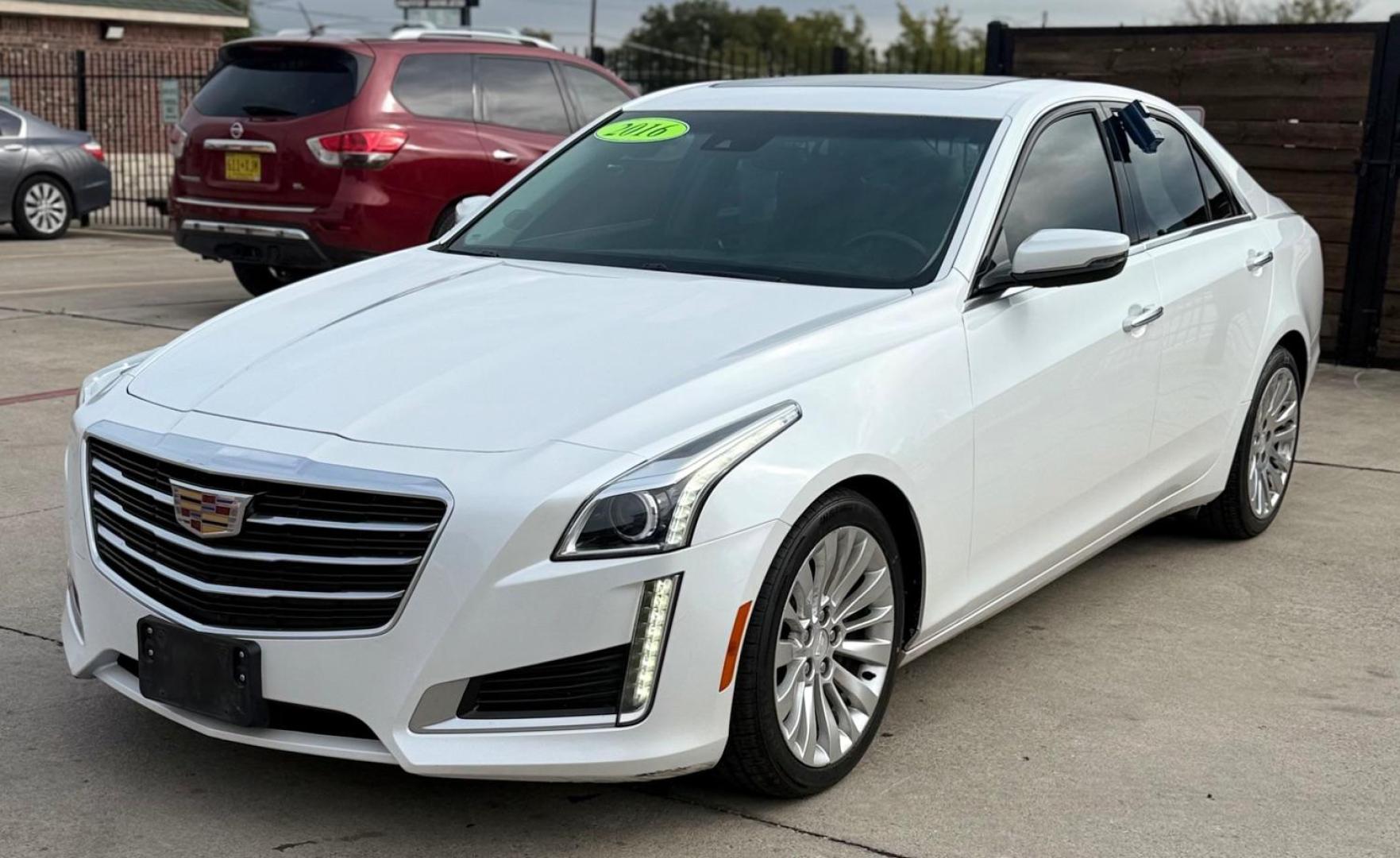 2016 White Cadillac CTS Luxury Collection (1G6AR5SX0G0) with an 2L I-4 gasoline direct injection engine, located at 2401 E Main St., Grand Prairie, TX, 75050, (972) 262-4440, 32.748981, -96.969643 - Photo#2