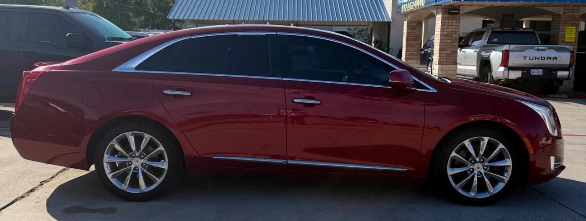 2014 Red Cadillac XTS Premium (2G61P5S35E9) with an 3.6L V-6 gasoline direct injection engine, located at 2401 E Main St., Grand Prairie, TX, 75050, (972) 262-4440, 32.748981, -96.969643 - Photo#2