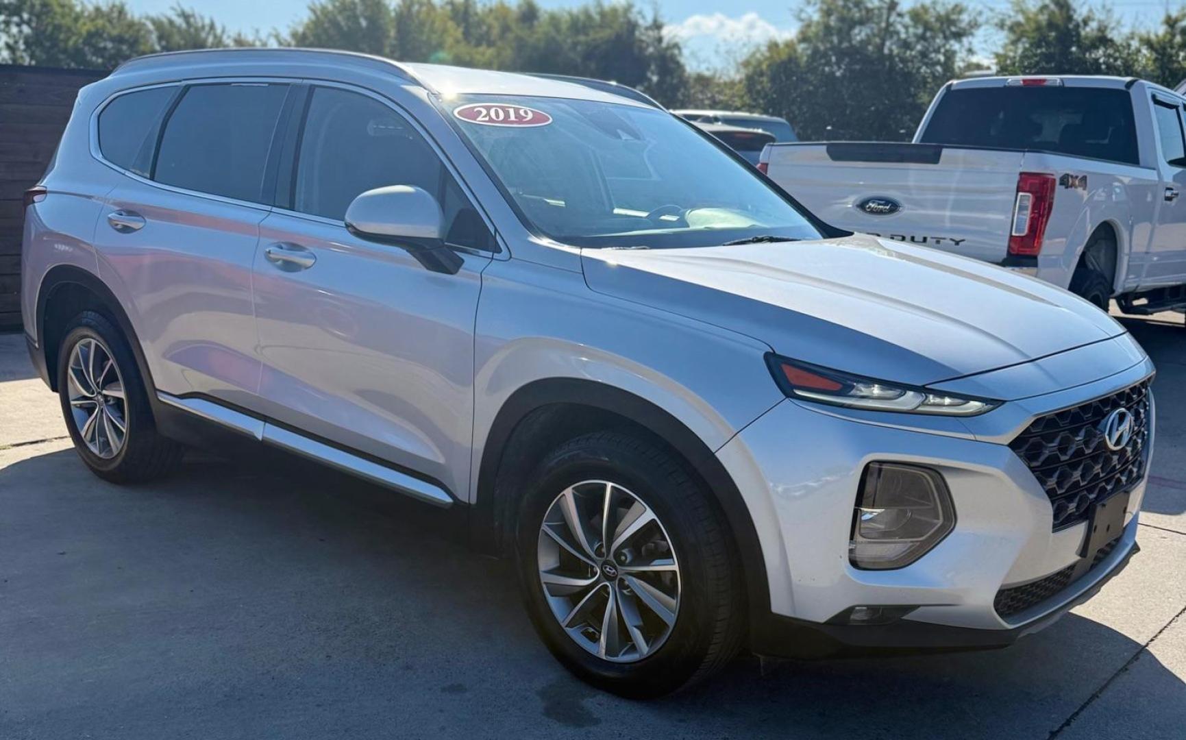2019 Silver Hyundai Santa Fe (5NMS33AD6KH) with an Theta II 2.4L I-4 gasoline direct injection engine, located at 2401 E Main St., Grand Prairie, TX, 75050, (972) 262-4440, 32.748981, -96.969643 - Photo#9