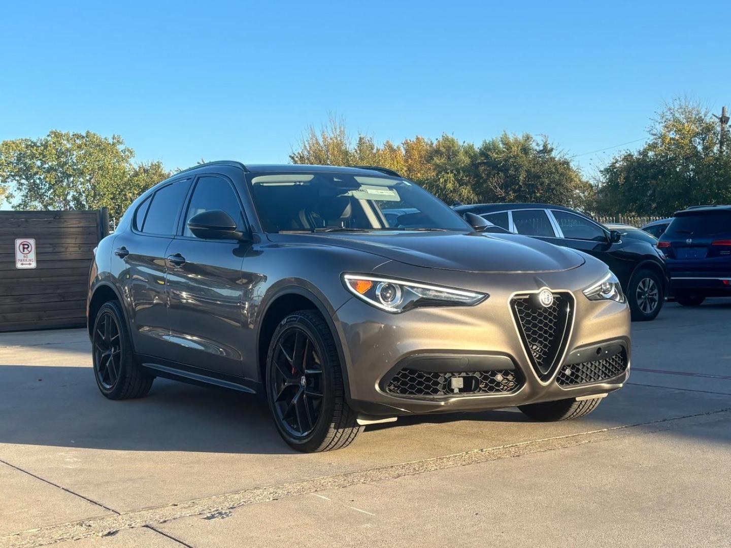 2019 Gray Alfa Romeo Stelvio Ti AWD (ZASPAKBN3K7) with an 2L I-4 gasoline direct injection engine, located at 2401 E Main St., Grand Prairie, TX, 75050, (972) 262-4440, 32.748981, -96.969643 - Photo#2