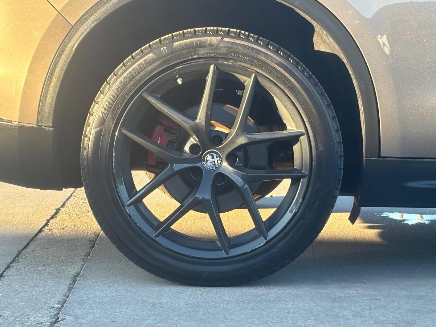 2019 Gray Alfa Romeo Stelvio Ti AWD (ZASPAKBN3K7) with an 2L I-4 gasoline direct injection engine, located at 2401 E Main St., Grand Prairie, TX, 75050, (972) 262-4440, 32.748981, -96.969643 - Photo#6