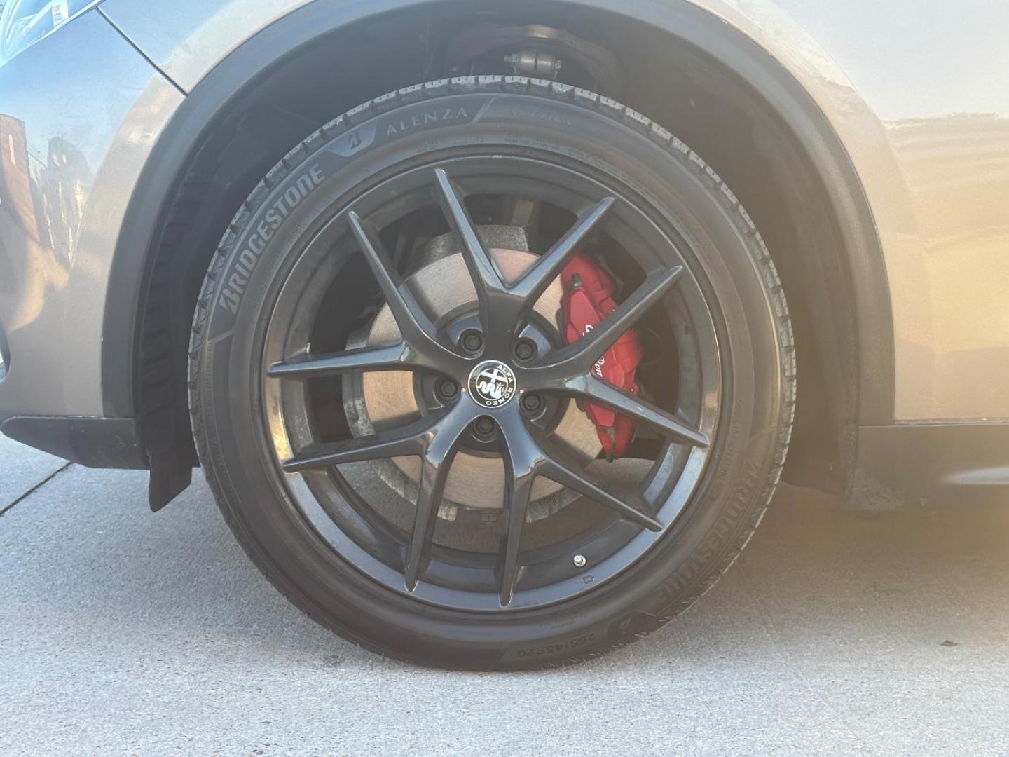 2019 Gray Alfa Romeo Stelvio Ti AWD (ZASPAKBN3K7) with an 2L I-4 gasoline direct injection engine, located at 2401 E Main St., Grand Prairie, TX, 75050, (972) 262-4440, 32.748981, -96.969643 - Photo#9