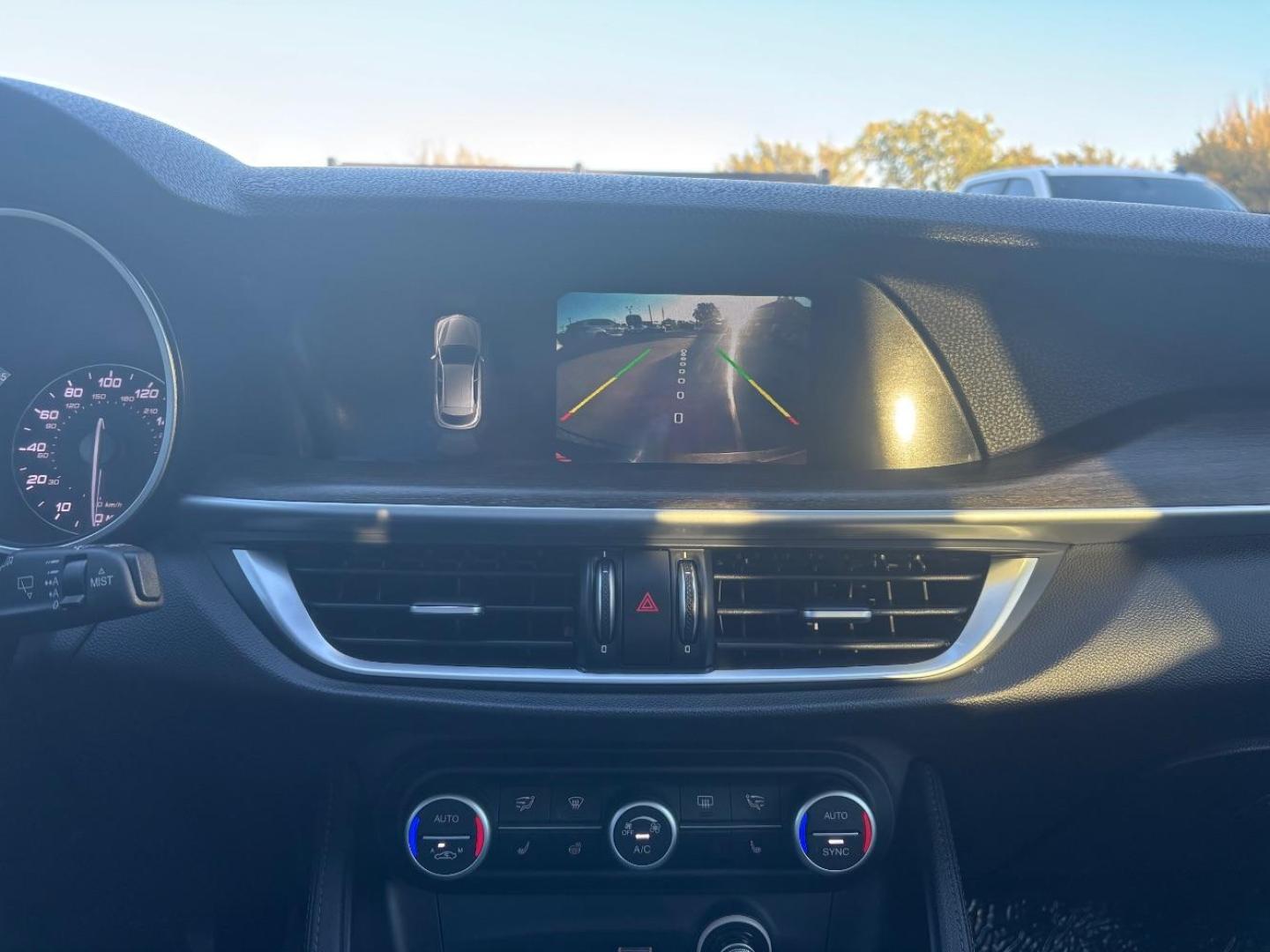 2019 Gray Alfa Romeo Stelvio Ti AWD (ZASPAKBN3K7) with an 2L I-4 gasoline direct injection engine, located at 2401 E Main St., Grand Prairie, TX, 75050, (972) 262-4440, 32.748981, -96.969643 - Photo#15