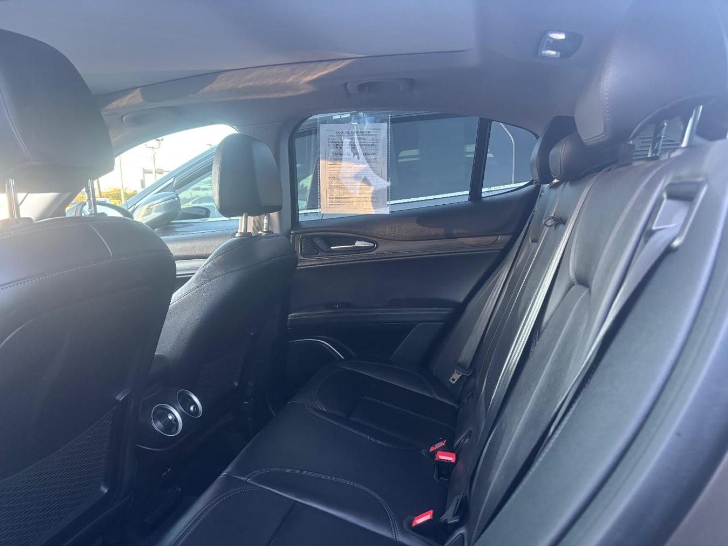 2019 Gray Alfa Romeo Stelvio Ti AWD (ZASPAKBN3K7) with an 2L I-4 gasoline direct injection engine, located at 2401 E Main St., Grand Prairie, TX, 75050, (972) 262-4440, 32.748981, -96.969643 - Photo#18