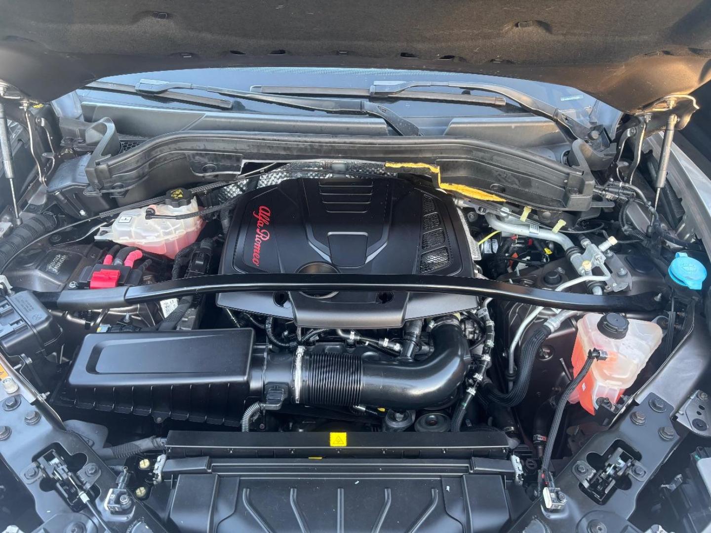 2019 Gray Alfa Romeo Stelvio Ti AWD (ZASPAKBN3K7) with an 2L I-4 gasoline direct injection engine, located at 2401 E Main St., Grand Prairie, TX, 75050, (972) 262-4440, 32.748981, -96.969643 - Photo#23