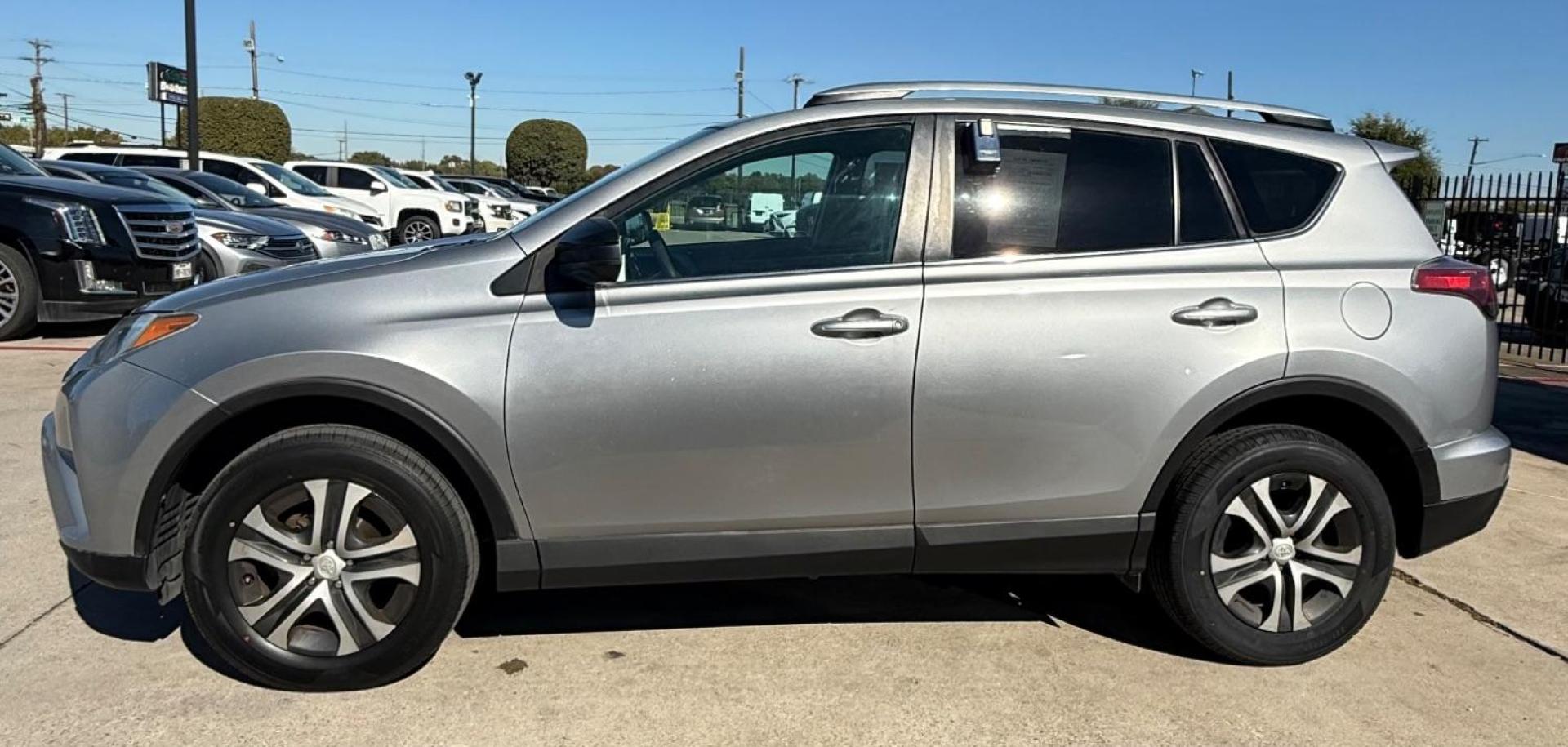 2016 Silver Toyota RAV4 LE (2T3ZFREVXGW) with an 2.5L I-4 DOHC engine, located at 2401 E Main St., Grand Prairie, TX, 75050, (972) 262-4440, 32.748981, -96.969643 - Photo#4
