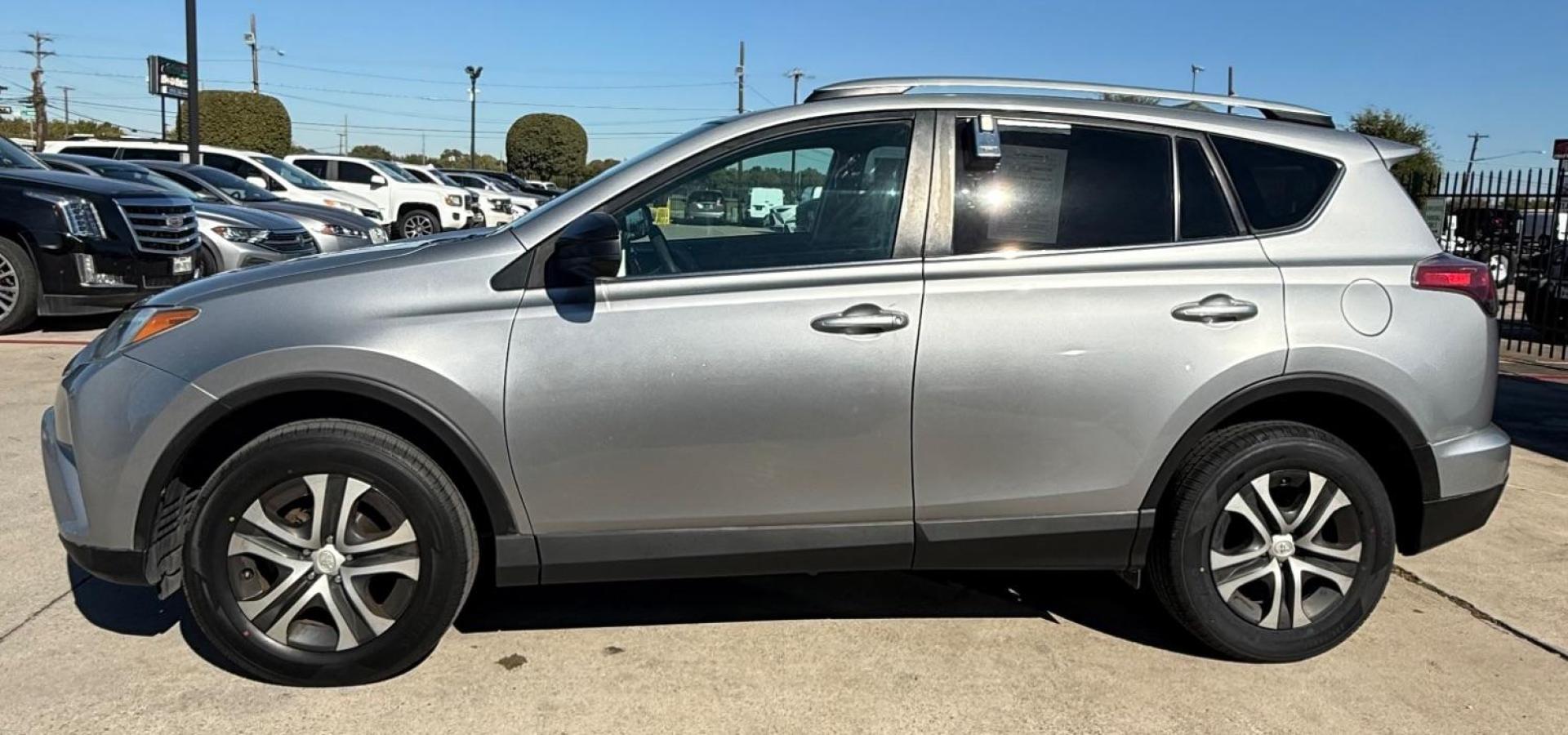 2016 Silver Toyota RAV4 LE (2T3ZFREVXGW) with an 2.5L I-4 DOHC engine, located at 2401 E Main St., Grand Prairie, TX, 75050, (972) 262-4440, 32.748981, -96.969643 - Photo#5