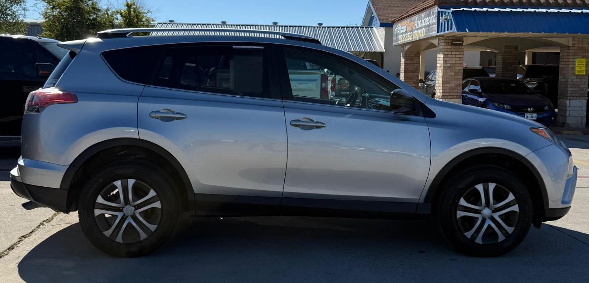 2016 Silver Toyota RAV4 LE (2T3ZFREVXGW) with an 2.5L I-4 DOHC engine, located at 2401 E Main St., Grand Prairie, TX, 75050, (972) 262-4440, 32.748981, -96.969643 - Photo#16