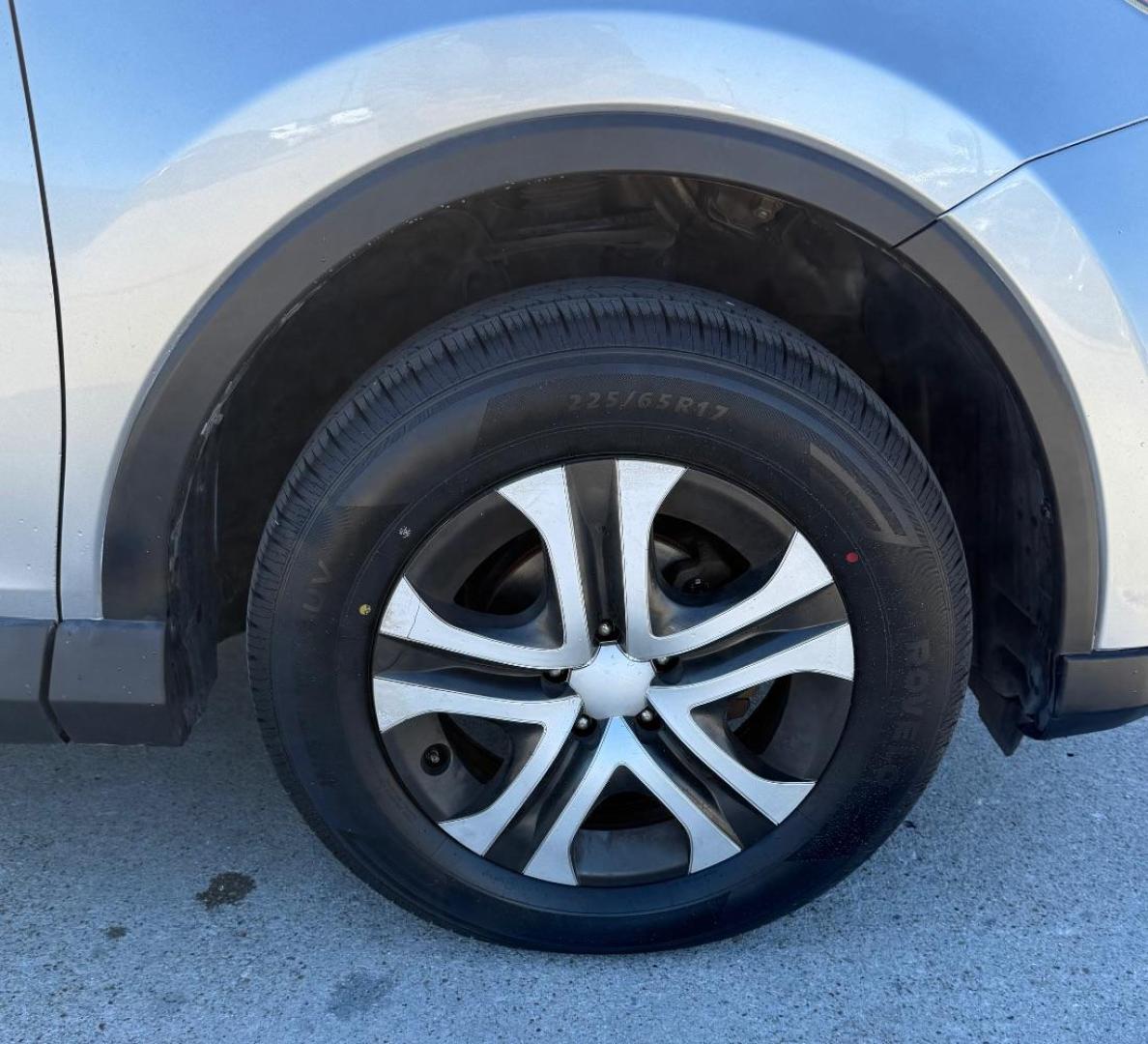 2016 Silver Toyota RAV4 LE (2T3ZFREVXGW) with an 2.5L I-4 DOHC engine, located at 2401 E Main St., Grand Prairie, TX, 75050, (972) 262-4440, 32.748981, -96.969643 - Photo#17
