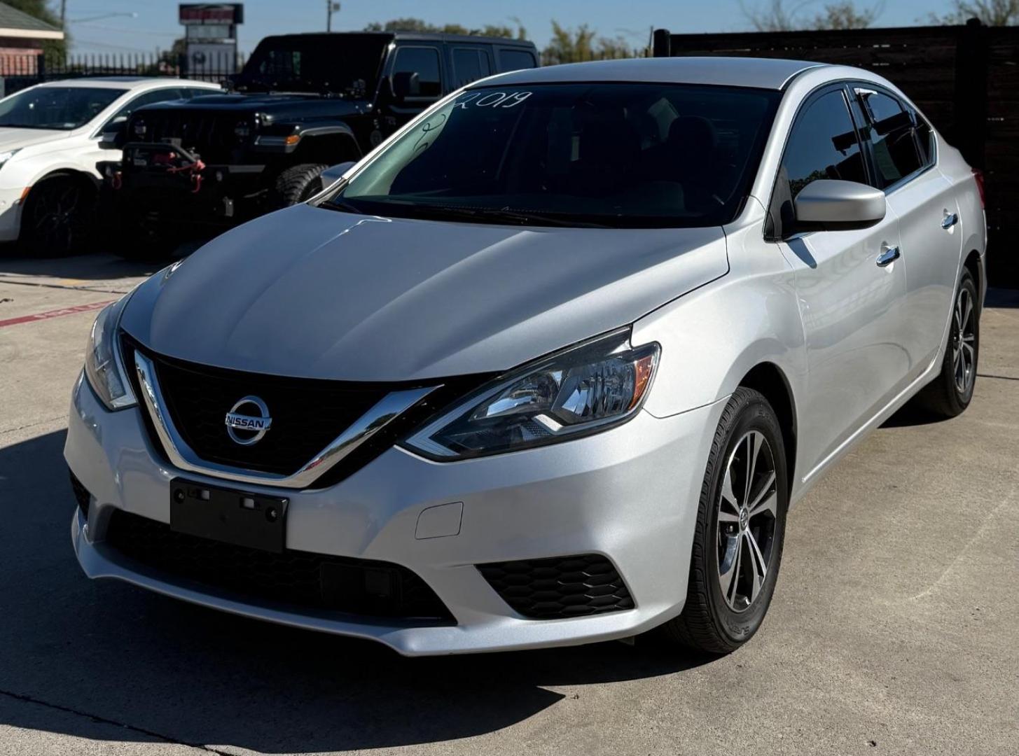 2019 Silver Nissan Sentra S (3N1AB7AP1KY) with an 1.8L I-4 DOHC engine, located at 2401 E Main St., Grand Prairie, TX, 75050, (972) 262-4440, 32.748981, -96.969643 - Photo#2