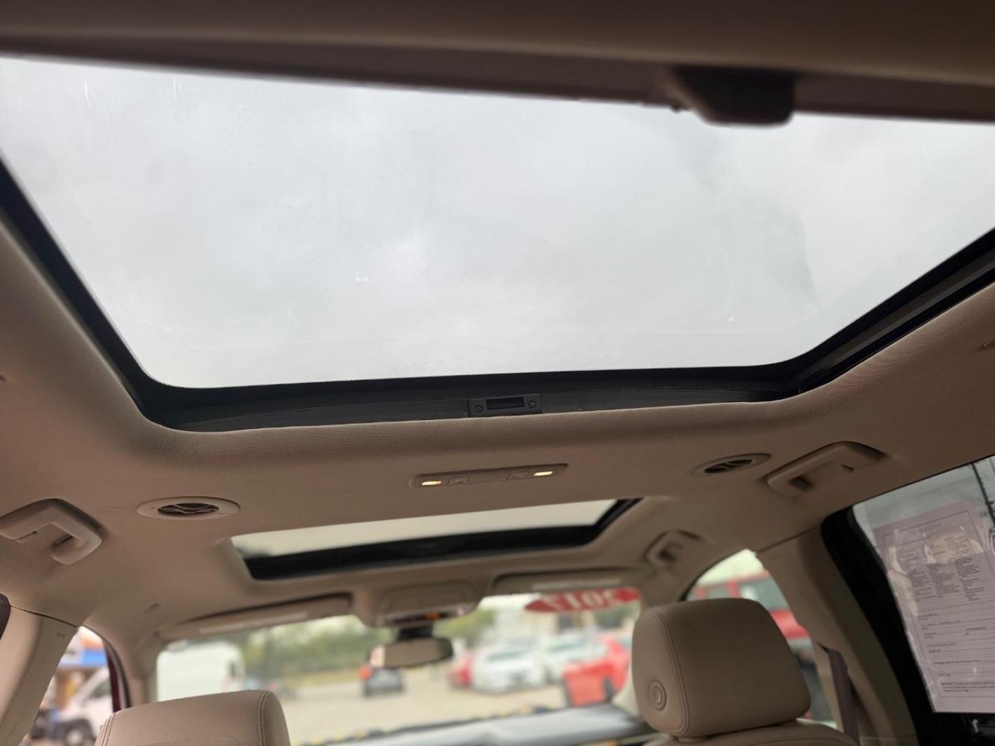 2017 Red GMC Acadia Denali (1GKKNPLS3HZ) with an 3.6L V-6 gasoline direct injection engine, located at 2401 E Main St., Grand Prairie, TX, 75050, (972) 262-4440, 32.748981, -96.969643 - Photo#28