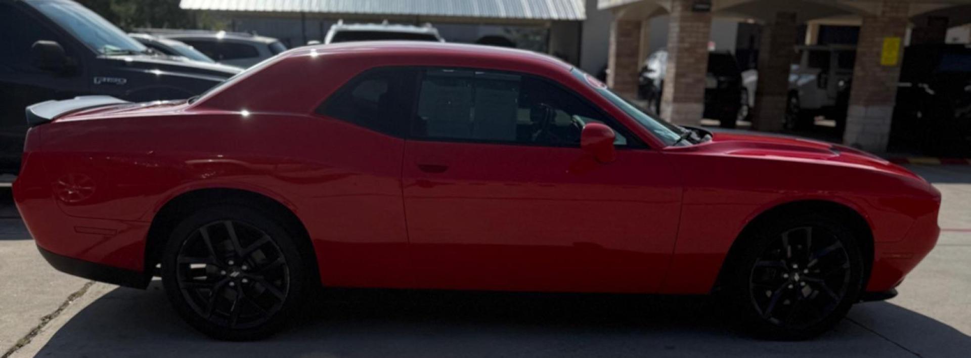 2021 Red Dodge Challenger (2C3CDZAG4MH) with an Pentastar 3.6L V-6 DOHC engine, located at 2401 E Main St., Grand Prairie, TX, 75050, (972) 262-4440, 32.748981, -96.969643 - Photo#2