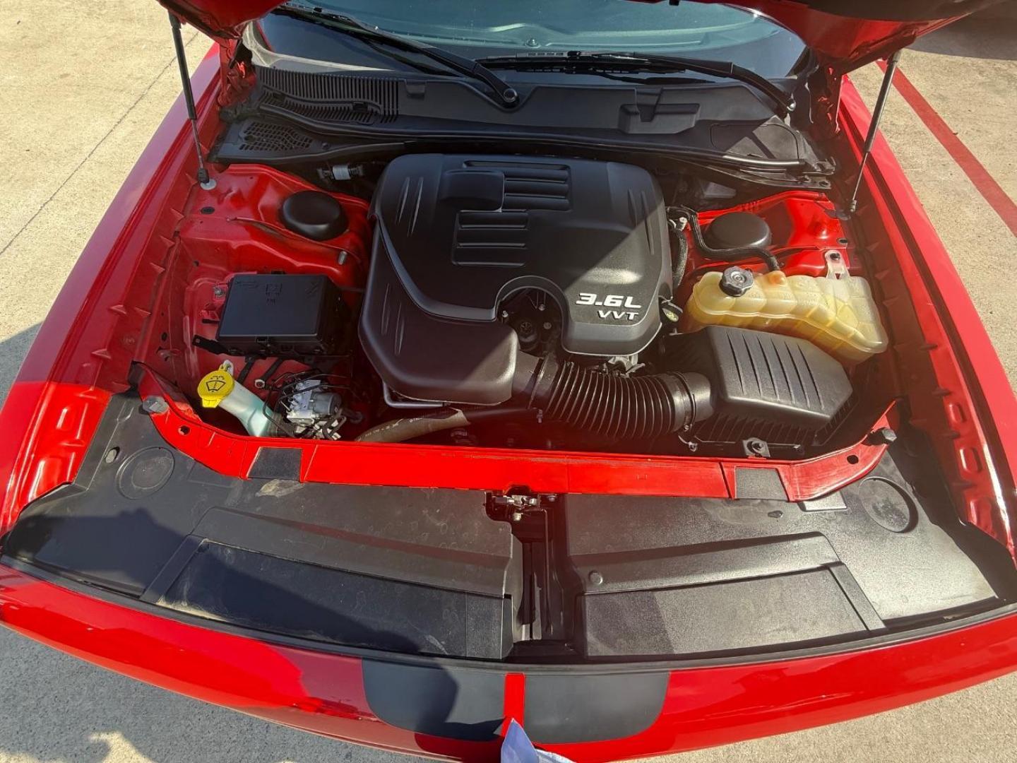2021 Red Dodge Challenger (2C3CDZAG4MH) with an Pentastar 3.6L V-6 DOHC engine, located at 2401 E Main St., Grand Prairie, TX, 75050, (972) 262-4440, 32.748981, -96.969643 - Photo#21