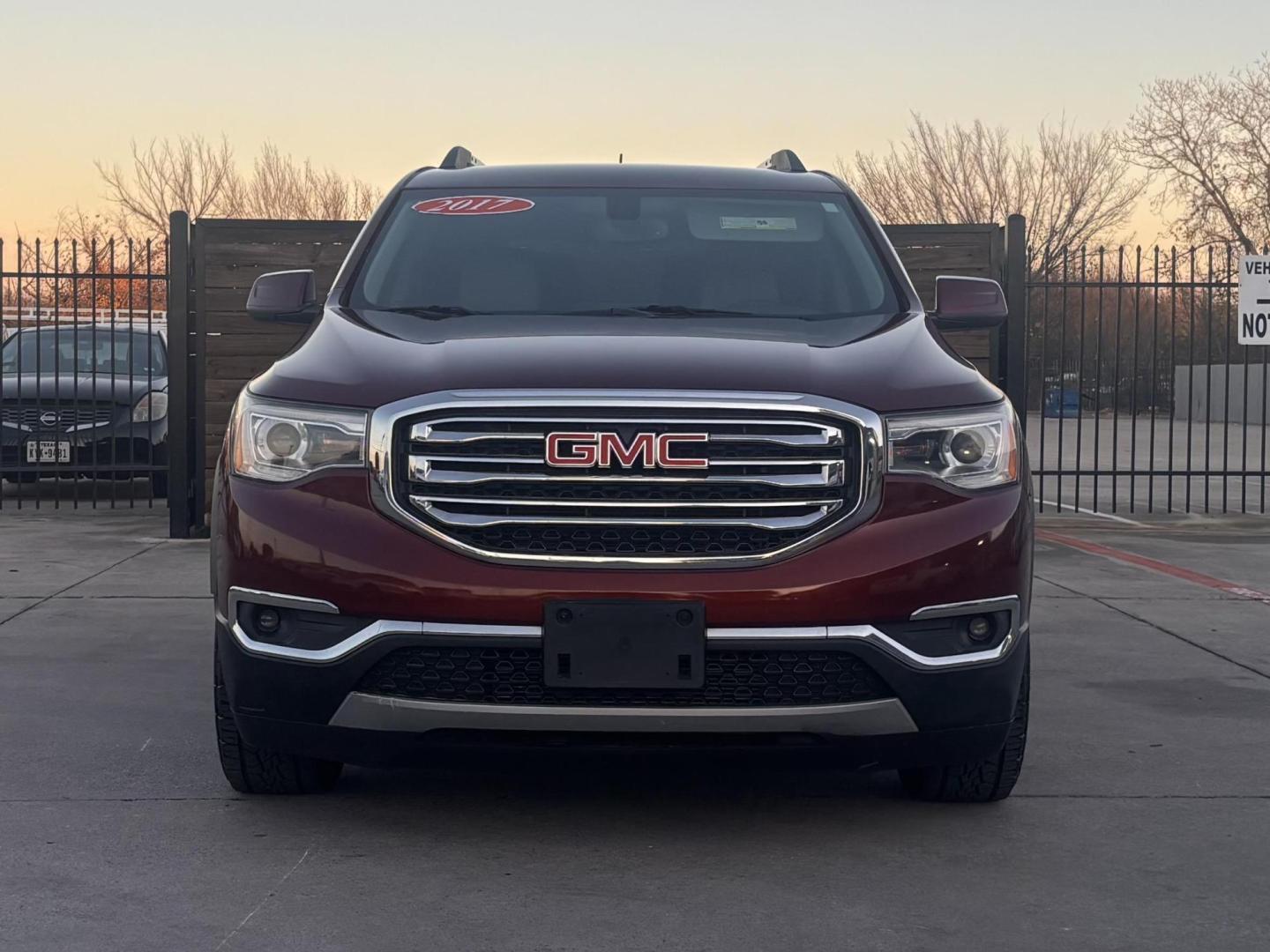 2017 Red Gmc Acadia (1GKKNMLS0HZ) , located at 2401 E Main St., Grand Prairie, TX, 75050, (972) 262-4440, 32.748981, -96.969643 - Photo#0