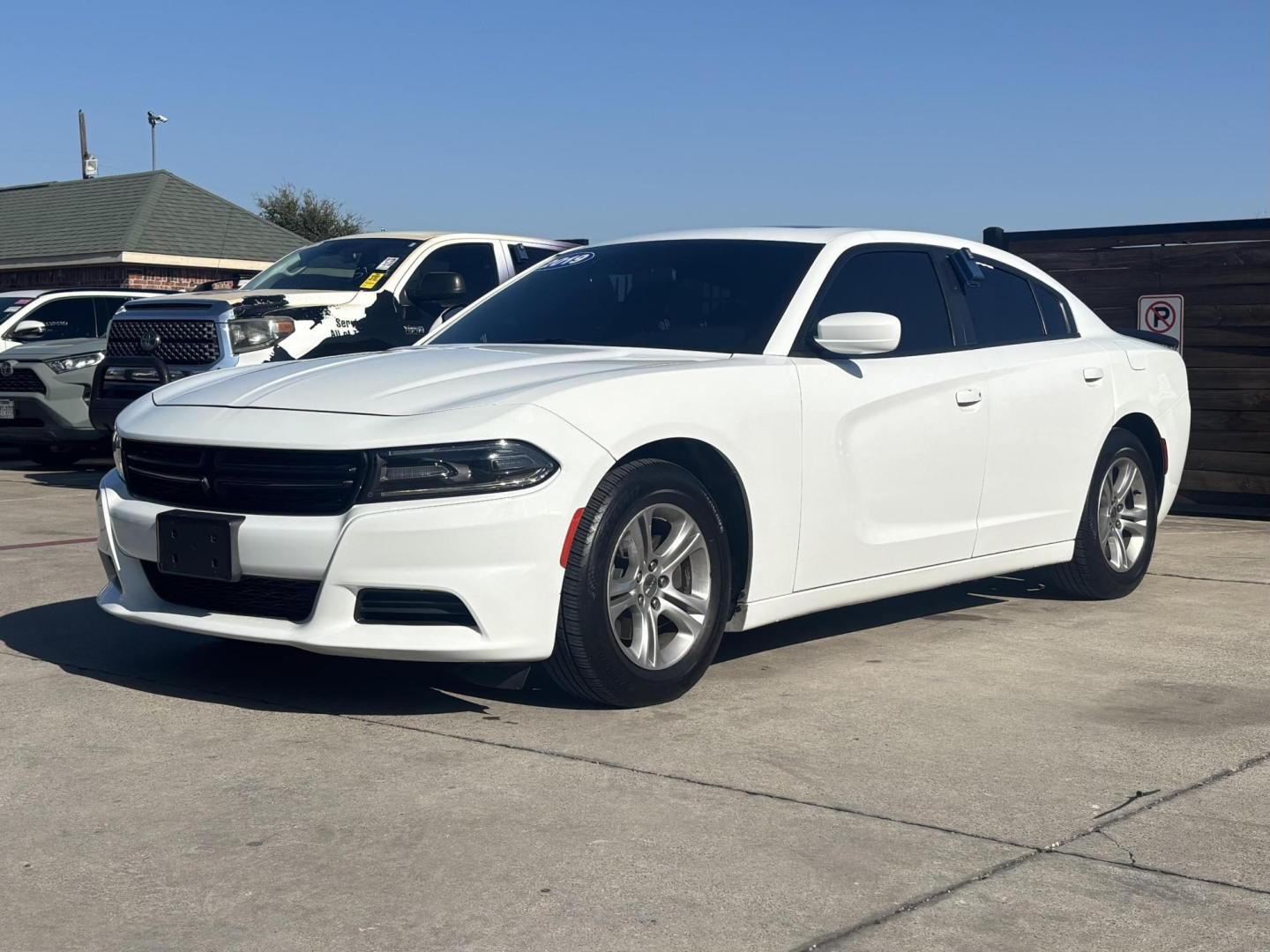 2019 White Dodge Charger (2C3CDXBG4KH) with an Pentastar 3.6L V-6 DOHC engine, located at 2401 E Main St., Grand Prairie, TX, 75050, (972) 262-4440, 32.748981, -96.969643 - Photo#0