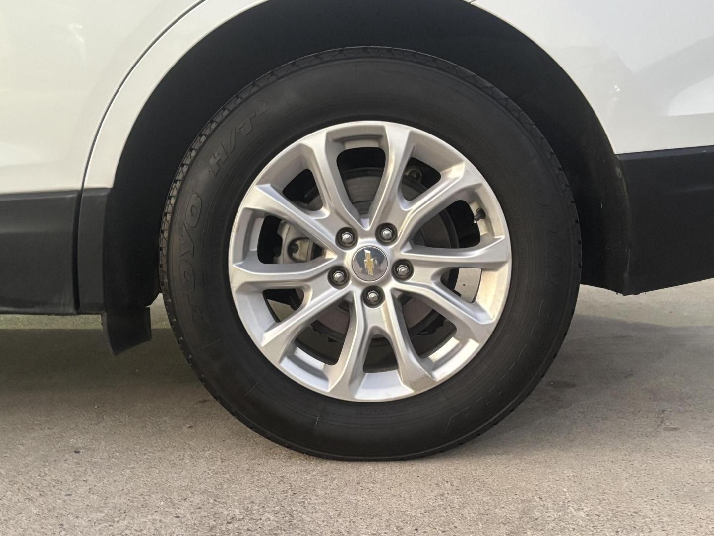 2021 White Chevrolet Equinox (3GNAXKEV1MS) with an 1.5L I-4 gasoline direct injection engine, located at 2401 E Main St., Grand Prairie, TX, 75050, (972) 262-4440, 32.748981, -96.969643 - Photo#2