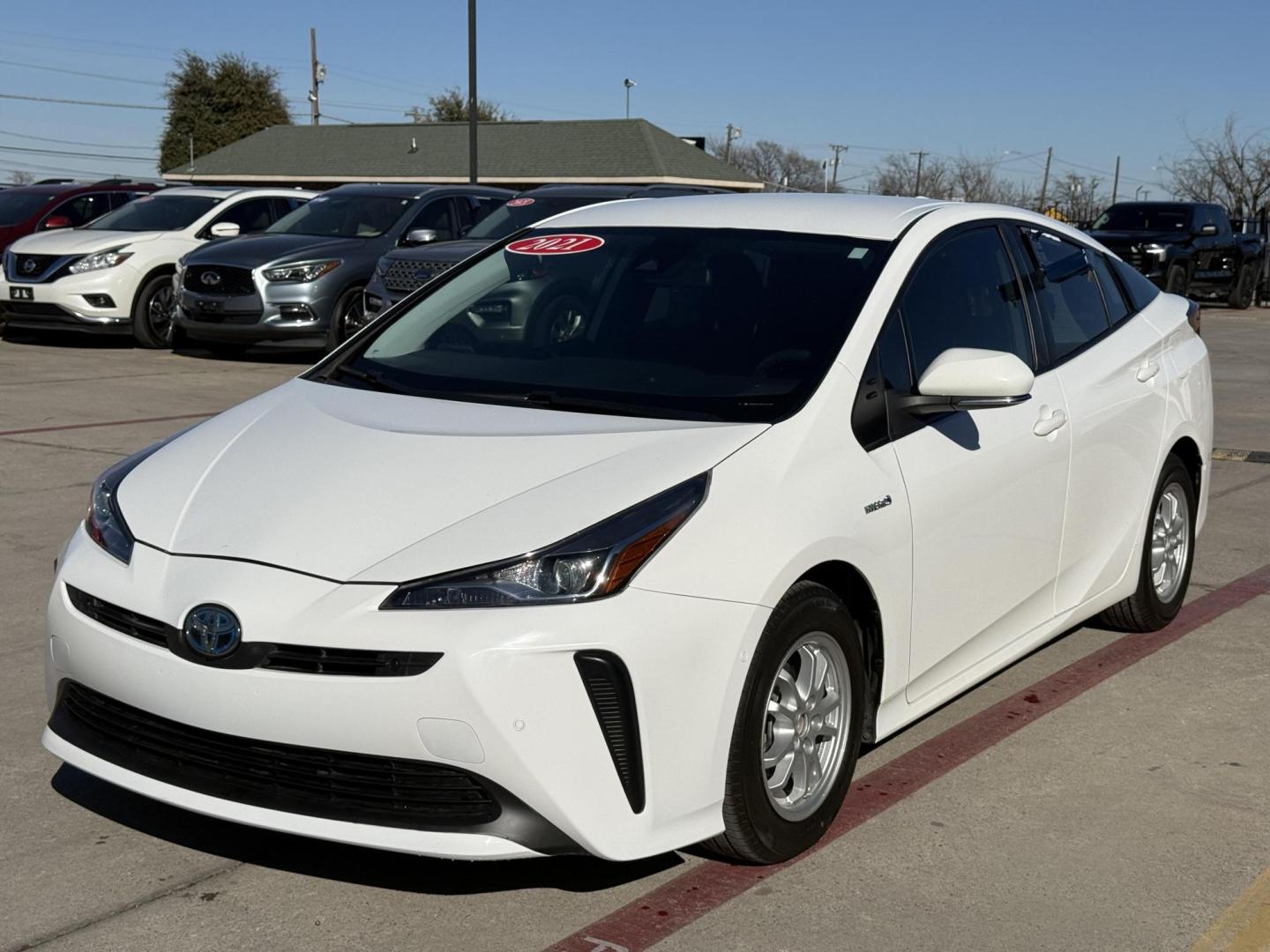 2021 Wind Chill Pearl /Black, cloth Harvest Beige, cloth Moonstone, cloth Toyota Prius 74087 (JTDKAMFU5M3) with an 1.8L L4 DOHC 16V HYBRID engine, Continuously Variable Transmission transmission, located at 2401 E Main St., Grand Prairie, TX, 75050, (972) 262-4440, 32.748981, -96.969643 - Photo#0