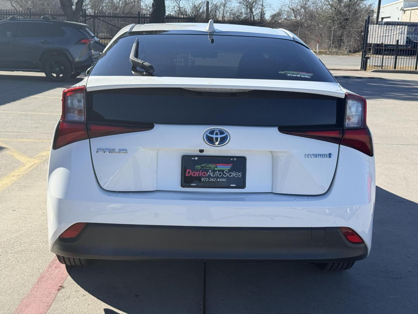 2021 Wind Chill Pearl /Black, cloth Harvest Beige, cloth Moonstone, cloth Toyota Prius 74087 (JTDKAMFU5M3) with an 1.8L L4 DOHC 16V HYBRID engine, Continuously Variable Transmission transmission, located at 2401 E Main St., Grand Prairie, TX, 75050, (972) 262-4440, 32.748981, -96.969643 - Photo#2