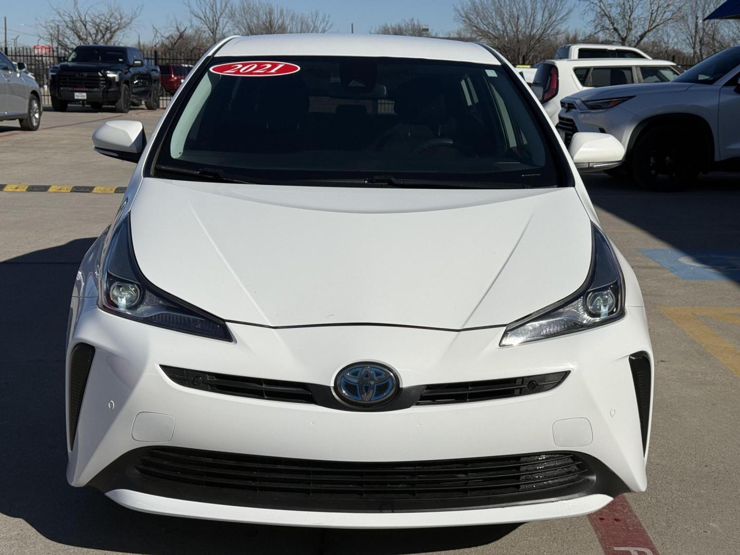 2021 Wind Chill Pearl /Black, cloth Harvest Beige, cloth Moonstone, cloth Toyota Prius 74087 (JTDKAMFU5M3) with an 1.8L L4 DOHC 16V HYBRID engine, Continuously Variable Transmission transmission, located at 2401 E Main St., Grand Prairie, TX, 75050, (972) 262-4440, 32.748981, -96.969643 - Photo#3