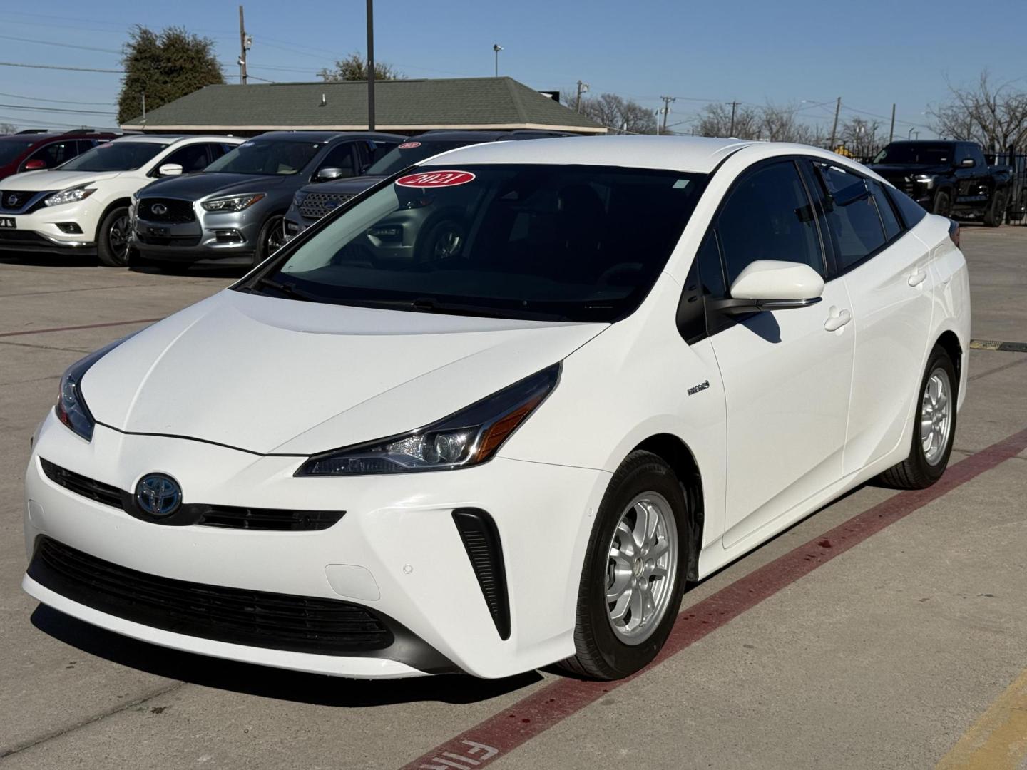 2021 Wind Chill Pearl /Black, cloth Harvest Beige, cloth Moonstone, cloth Toyota Prius 74087 (JTDKAMFU5M3) with an 1.8L L4 DOHC 16V HYBRID engine, Continuously Variable Transmission transmission, located at 2401 E Main St., Grand Prairie, TX, 75050, (972) 262-4440, 32.748981, -96.969643 - Photo#4