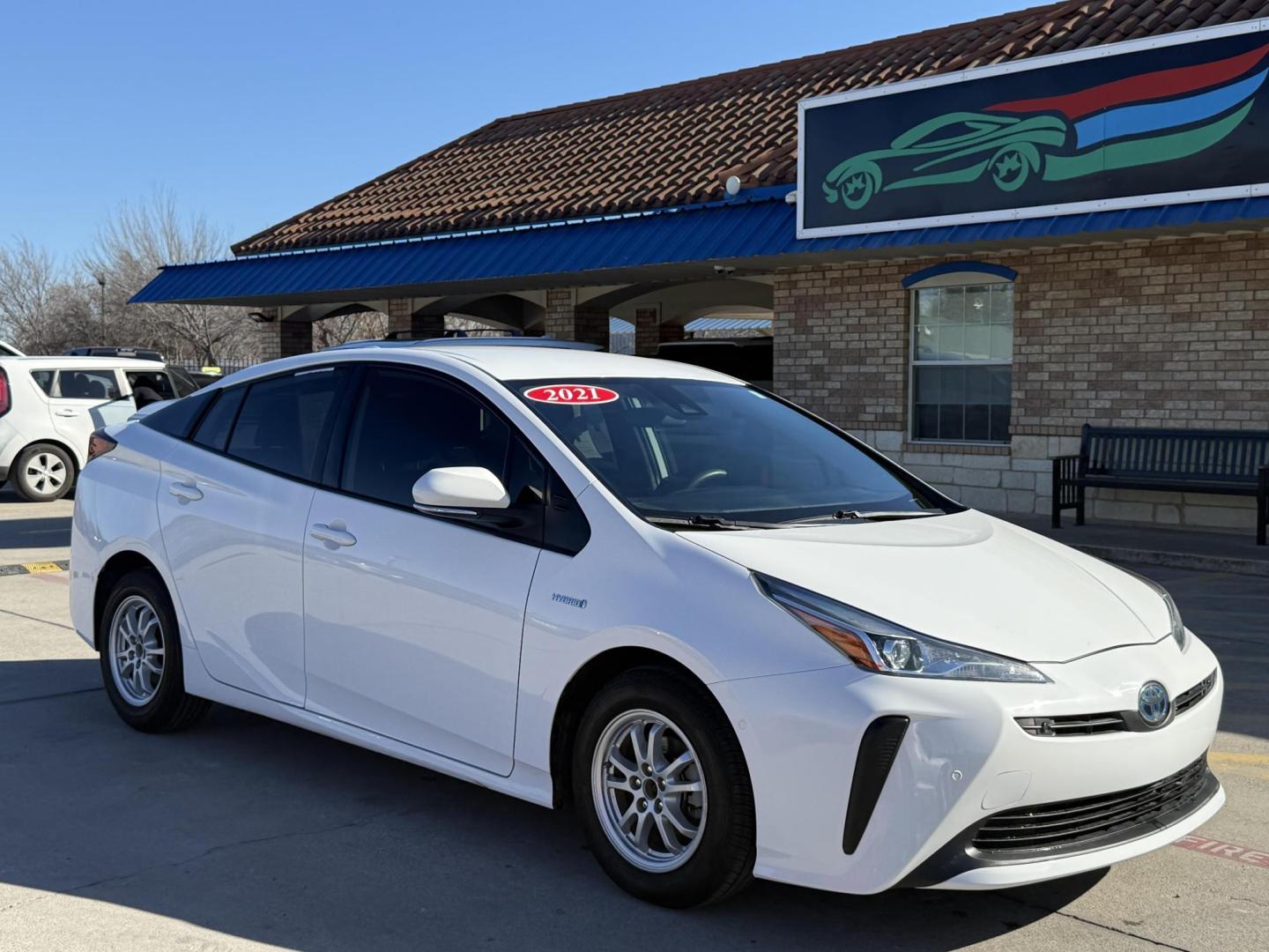 2021 Wind Chill Pearl /Black, cloth Harvest Beige, cloth Moonstone, cloth Toyota Prius 74087 (JTDKAMFU5M3) with an 1.8L L4 DOHC 16V HYBRID engine, Continuously Variable Transmission transmission, located at 2401 E Main St., Grand Prairie, TX, 75050, (972) 262-4440, 32.748981, -96.969643 - Photo#6