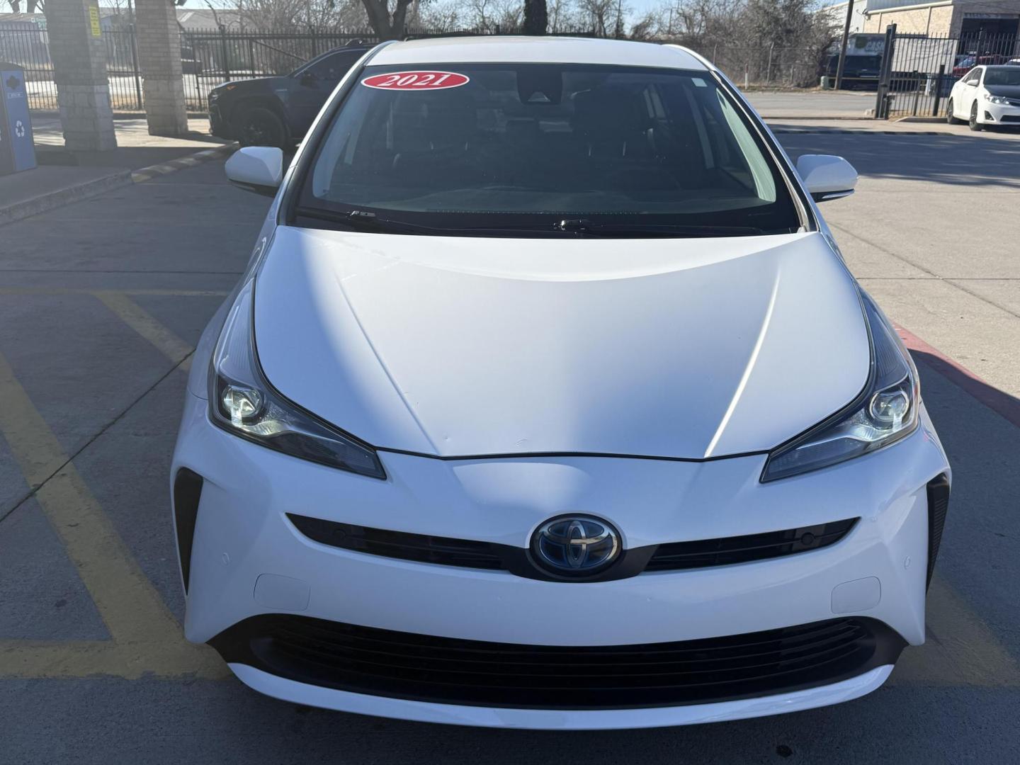 2021 Wind Chill Pearl /Black, cloth Harvest Beige, cloth Moonstone, cloth Toyota Prius 74087 (JTDKAMFU5M3) with an 1.8L L4 DOHC 16V HYBRID engine, Continuously Variable Transmission transmission, located at 2401 E Main St., Grand Prairie, TX, 75050, (972) 262-4440, 32.748981, -96.969643 - Photo#14
