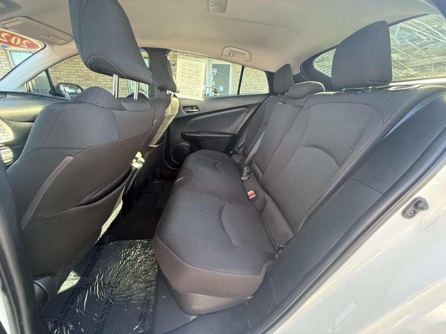 2021 Wind Chill Pearl /Black, cloth Harvest Beige, cloth Moonstone, cloth Toyota Prius 74087 (JTDKAMFU5M3) with an 1.8L L4 DOHC 16V HYBRID engine, Continuously Variable Transmission transmission, located at 2401 E Main St., Grand Prairie, TX, 75050, (972) 262-4440, 32.748981, -96.969643 - Photo#22