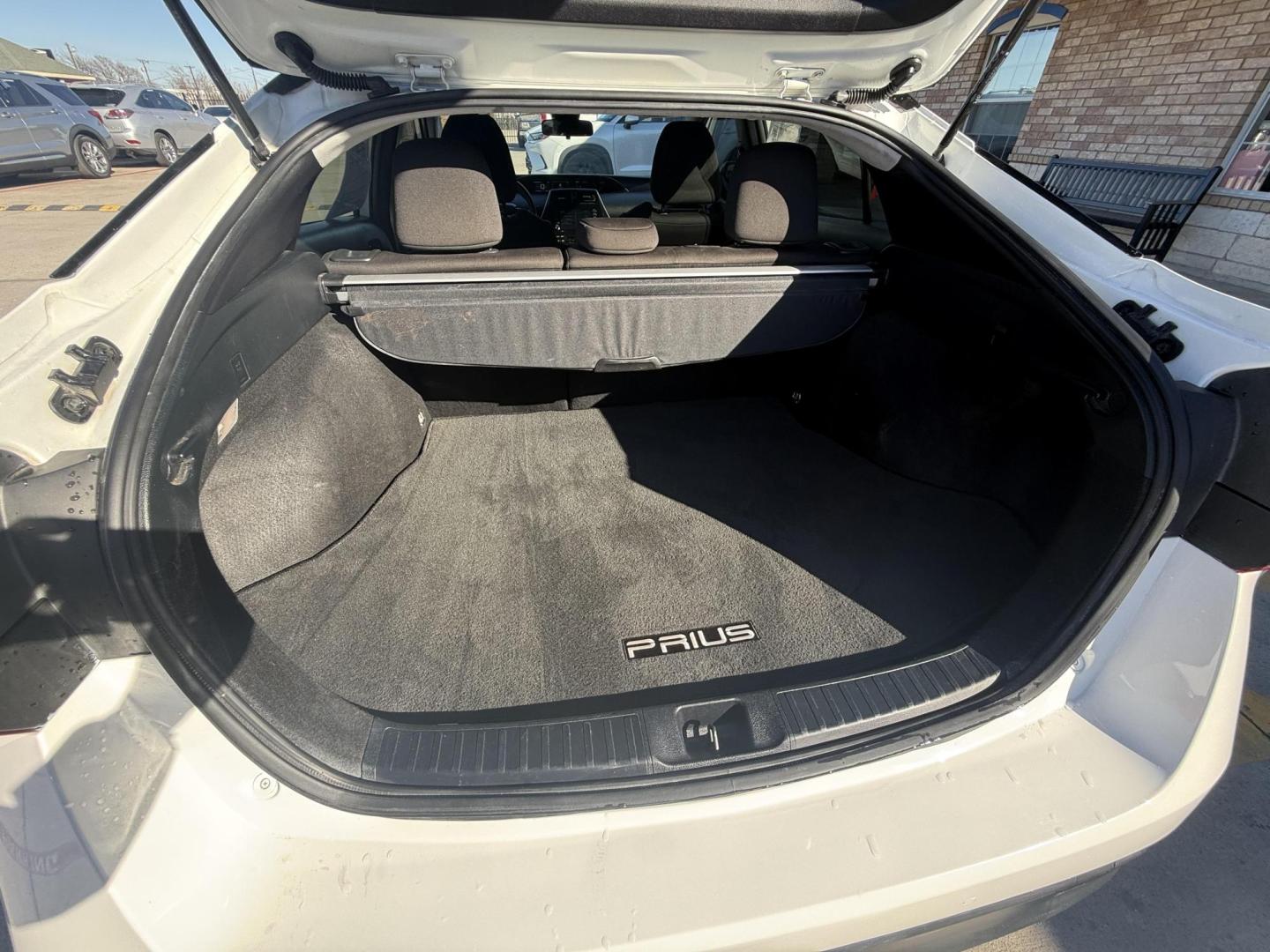 2021 Wind Chill Pearl /Black, cloth Harvest Beige, cloth Moonstone, cloth Toyota Prius 74087 (JTDKAMFU5M3) with an 1.8L L4 DOHC 16V HYBRID engine, Continuously Variable Transmission transmission, located at 2401 E Main St., Grand Prairie, TX, 75050, (972) 262-4440, 32.748981, -96.969643 - Photo#23