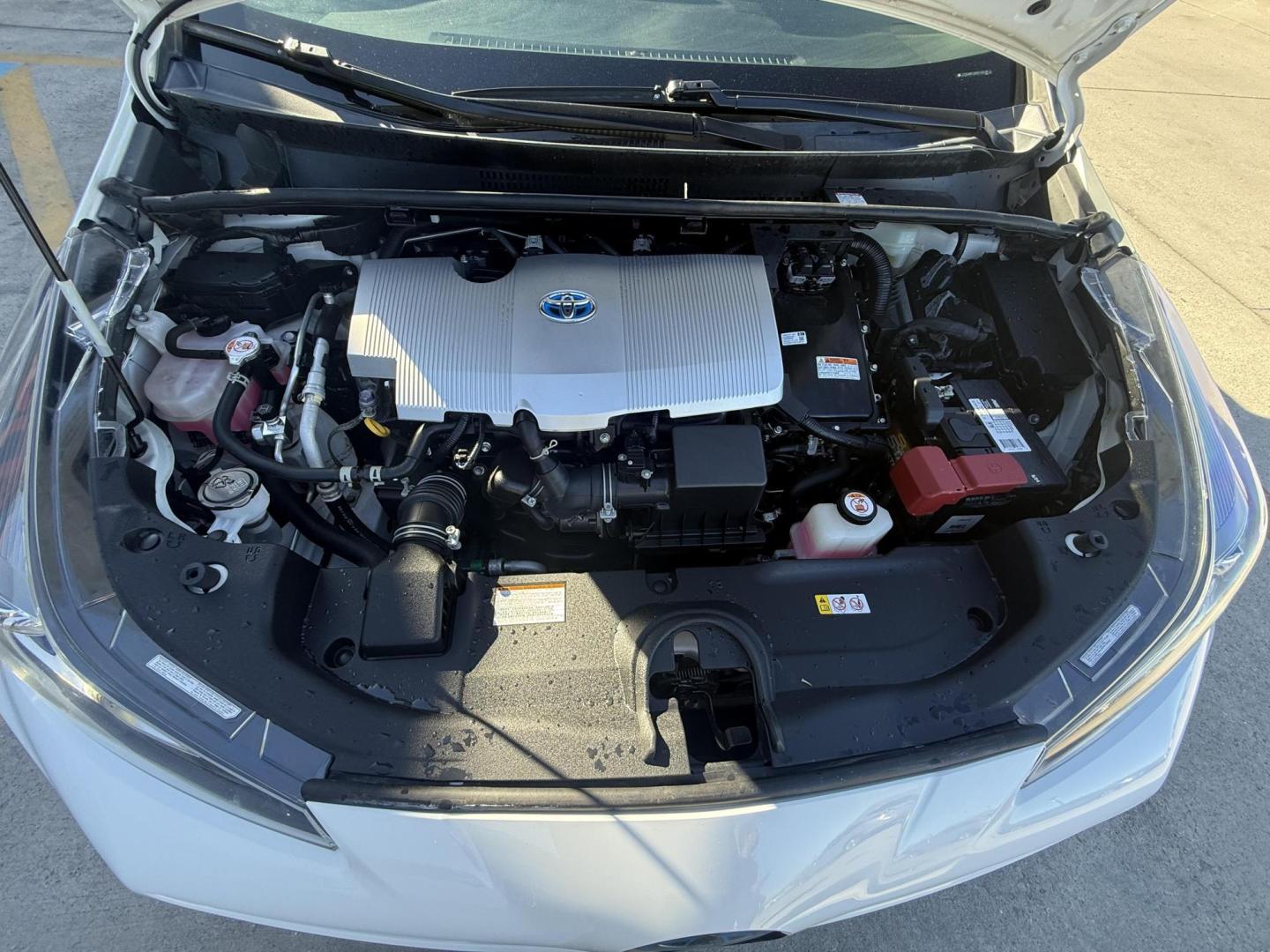 2021 Wind Chill Pearl /Black, cloth Harvest Beige, cloth Moonstone, cloth Toyota Prius 74087 (JTDKAMFU5M3) with an 1.8L L4 DOHC 16V HYBRID engine, Continuously Variable Transmission transmission, located at 2401 E Main St., Grand Prairie, TX, 75050, (972) 262-4440, 32.748981, -96.969643 - Photo#24