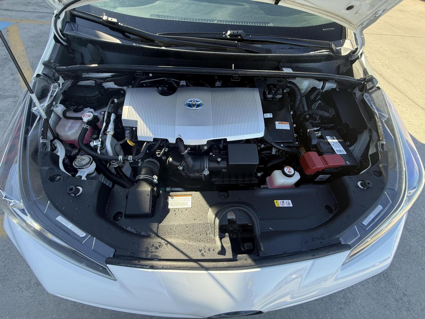 2021 Wind Chill Pearl /Black, cloth Harvest Beige, cloth Moonstone, cloth Toyota Prius 74087 (JTDKAMFU5M3) with an 1.8L L4 DOHC 16V HYBRID engine, Continuously Variable Transmission transmission, located at 2401 E Main St., Grand Prairie, TX, 75050, (972) 262-4440, 32.748981, -96.969643 - Photo#25