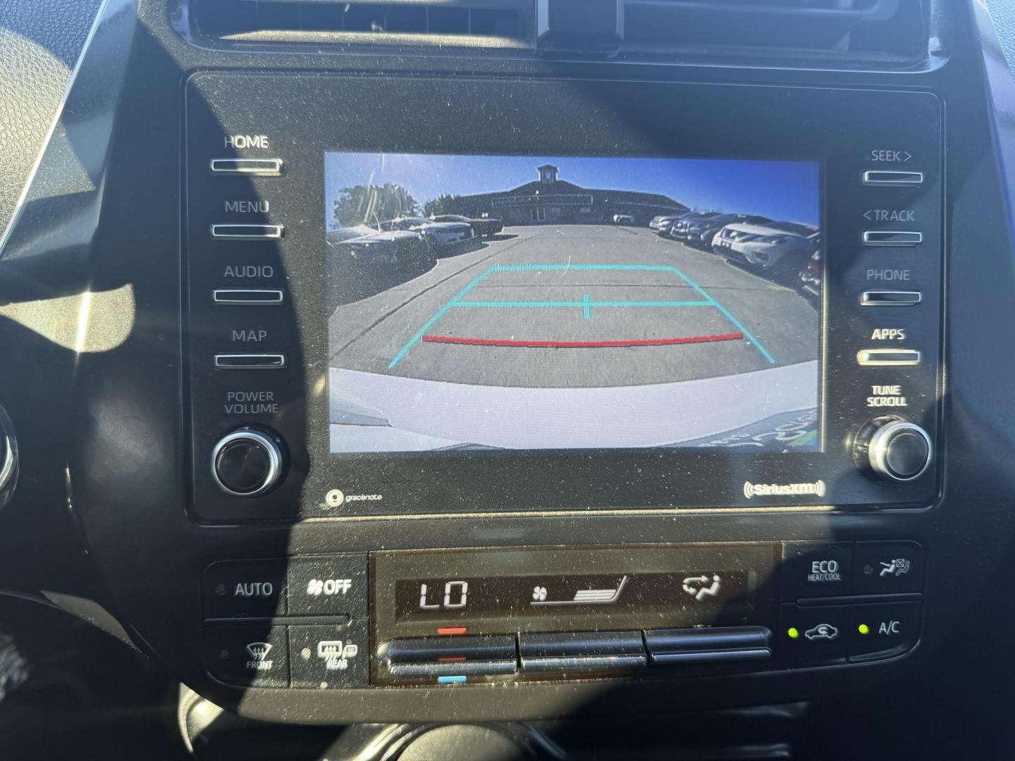 2021 Wind Chill Pearl /Black, cloth Harvest Beige, cloth Moonstone, cloth Toyota Prius 74087 (JTDKAMFU5M3) with an 1.8L L4 DOHC 16V HYBRID engine, Continuously Variable Transmission transmission, located at 2401 E Main St., Grand Prairie, TX, 75050, (972) 262-4440, 32.748981, -96.969643 - Photo#32