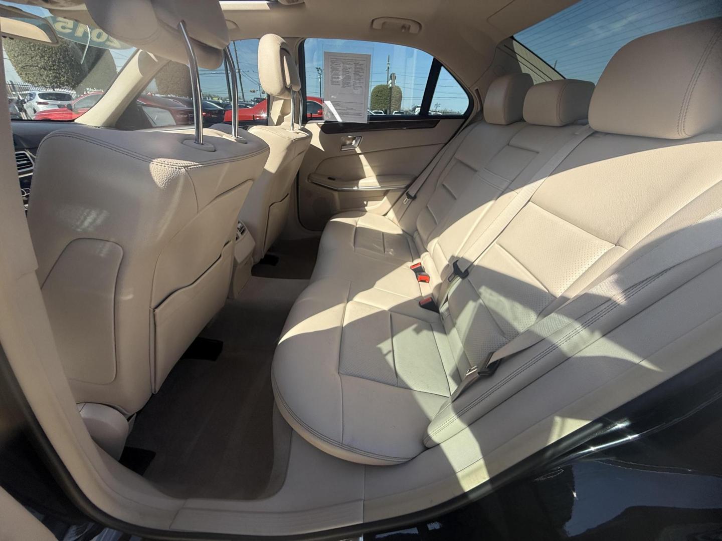 2015 Black /Black , leatherette Black Nappa, premium leather B Mercedes-Benz E-Class 50930 (WDDHF8JB4FB) with an 3.5L V6 DOHC 24V engine, 7-Speed Automatic transmission, located at 2401 E Main St., Grand Prairie, TX, 75050, (972) 262-4440, 32.748981, -96.969643 - Photo#3