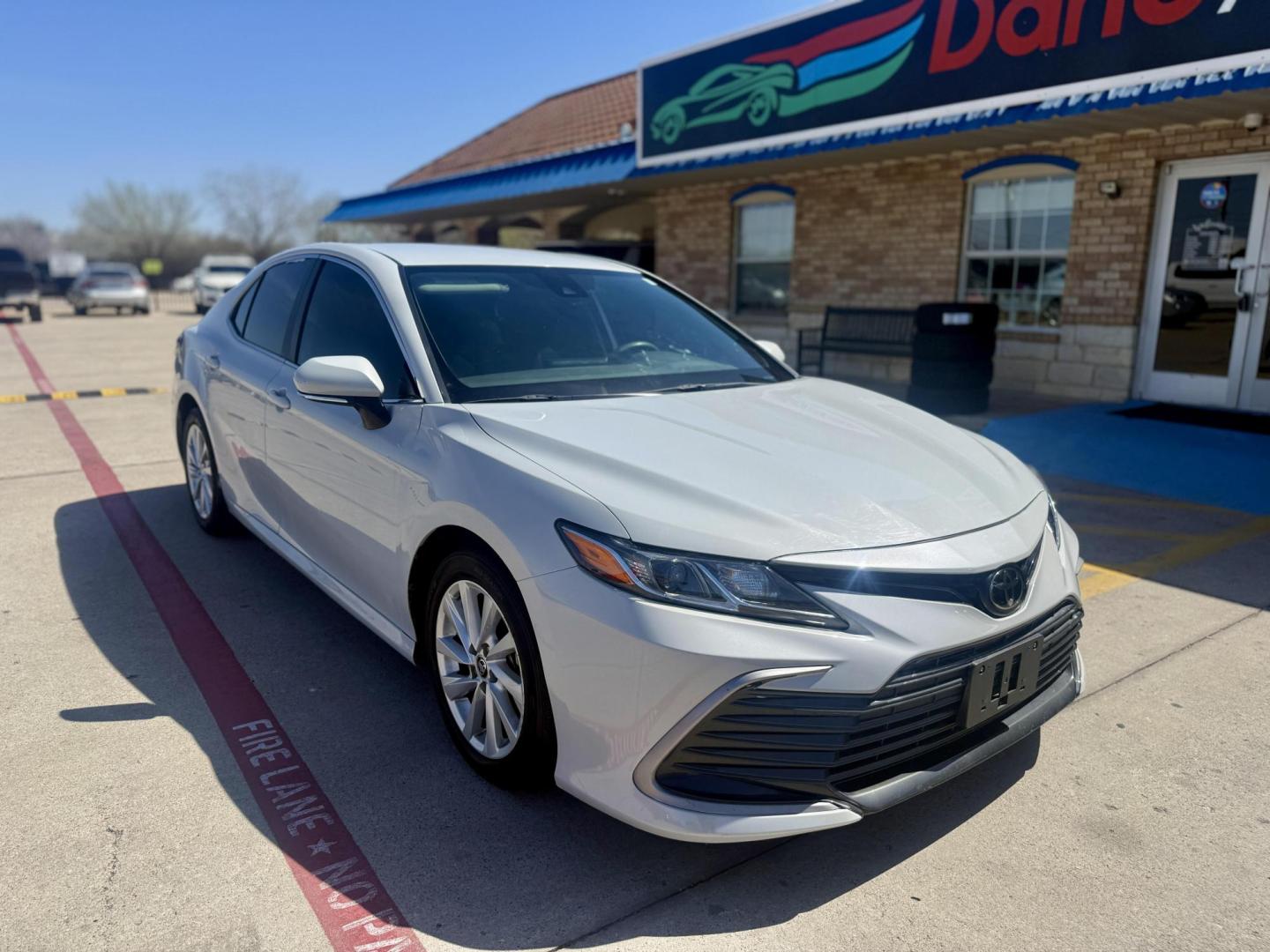 2023 Ice Cap /Macadamia Black Ash Toyota Camry 79444 (4T1C11AK1PU) with an 2.5L L4 DOHC 16V engine, 8-Speed Automatic transmission, located at 2401 E Main St., Grand Prairie, TX, 75050, (972) 262-4440, 32.748981, -96.969643 - Photo#2
