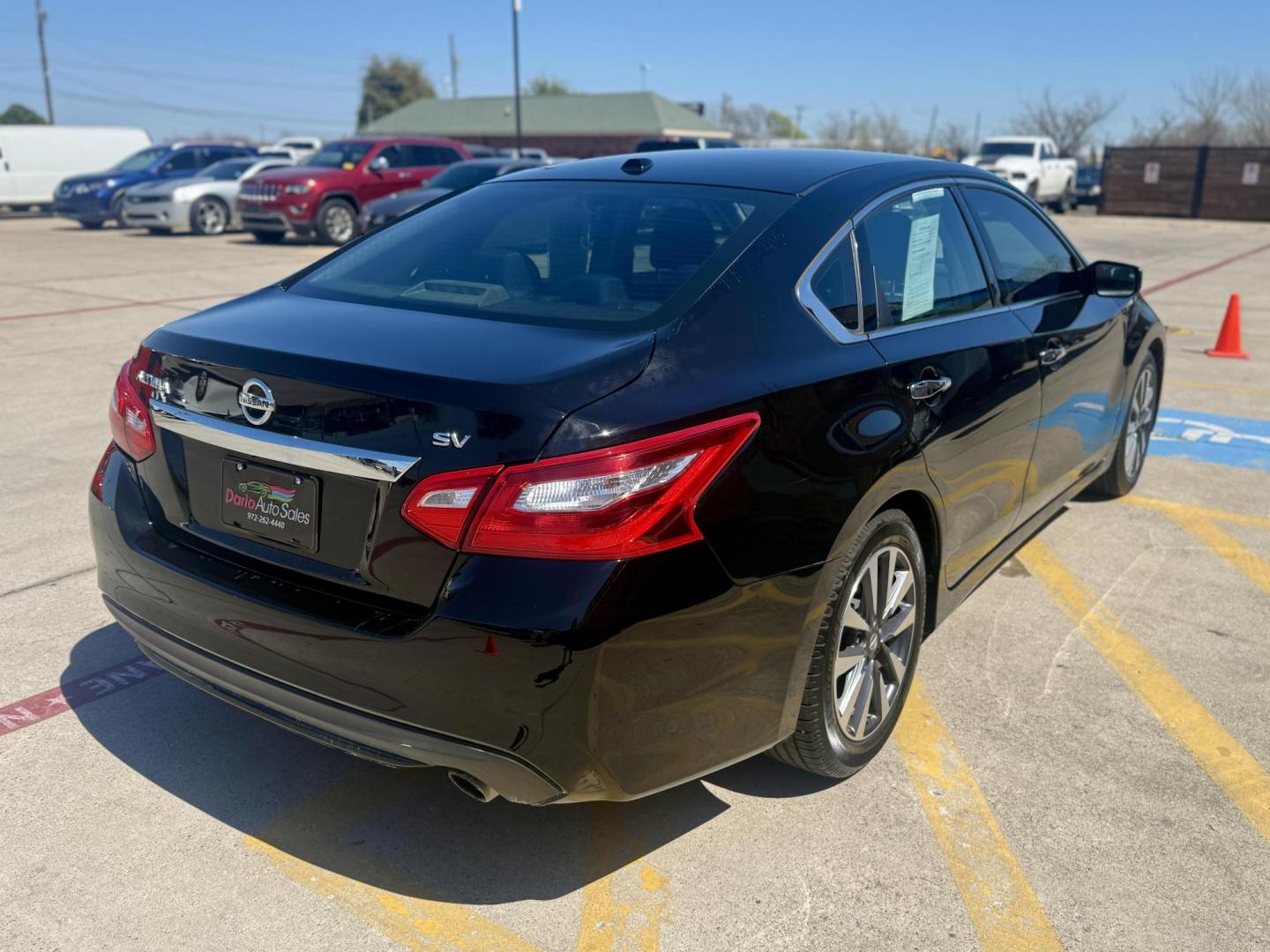 2017 Super Black /Beige, cloth Charcoal, cloth Nissan Altima 56189 (1N4AL3AP7HC) with an 2.5L L4 DOHC 16V engine, Continuously Variable Transmission transmission, located at 2401 E Main St., Grand Prairie, TX, 75050, (972) 262-4440, 32.748981, -96.969643 - Photo#4
